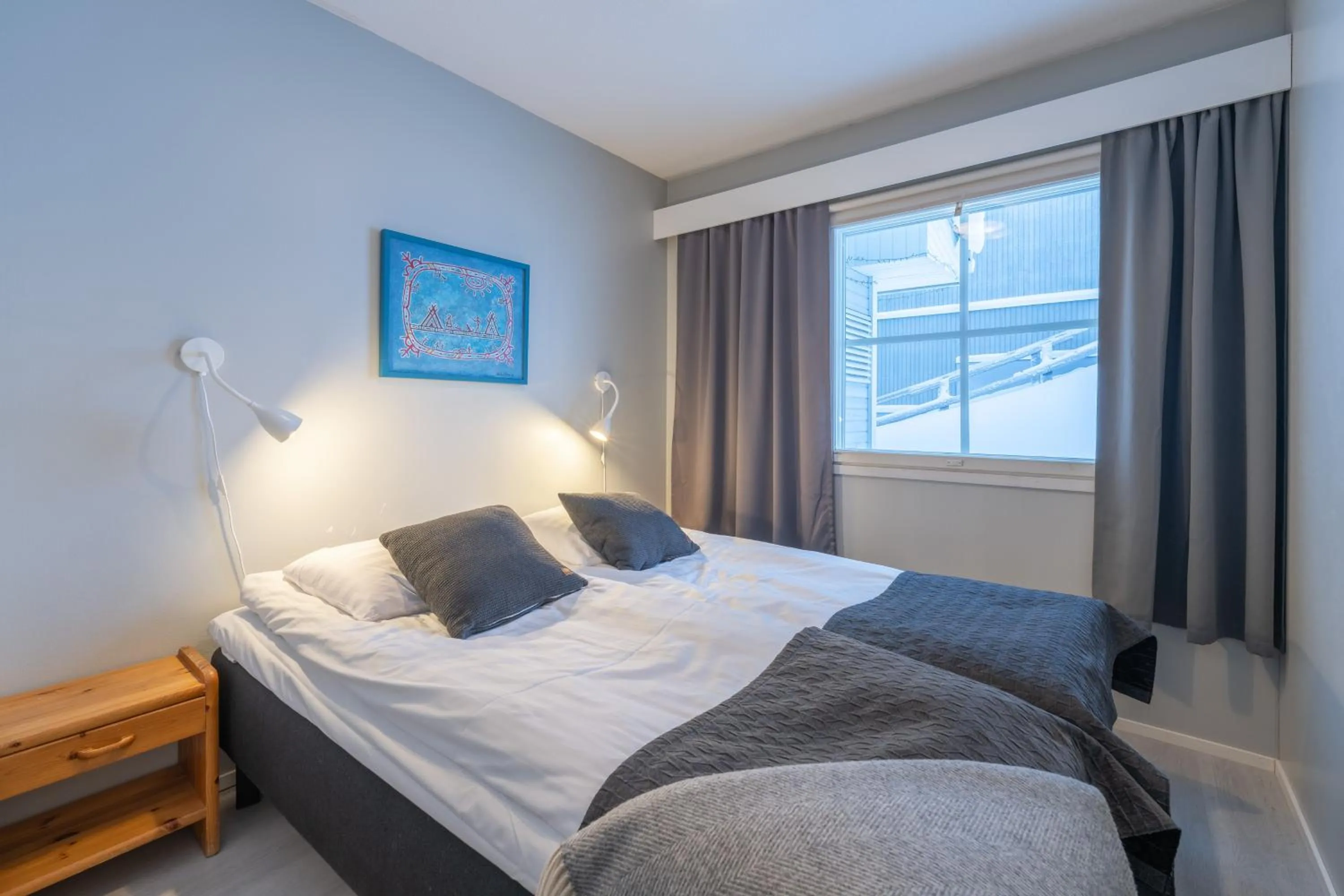 Bed in Kuukkeli Apartments