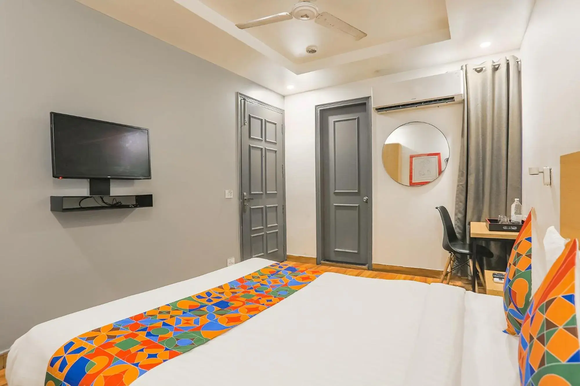 Communal lounge/ TV room, Bed in FabExpress PP Residency Communal lounge/ TV room, Bed in FabExpress PP Residency