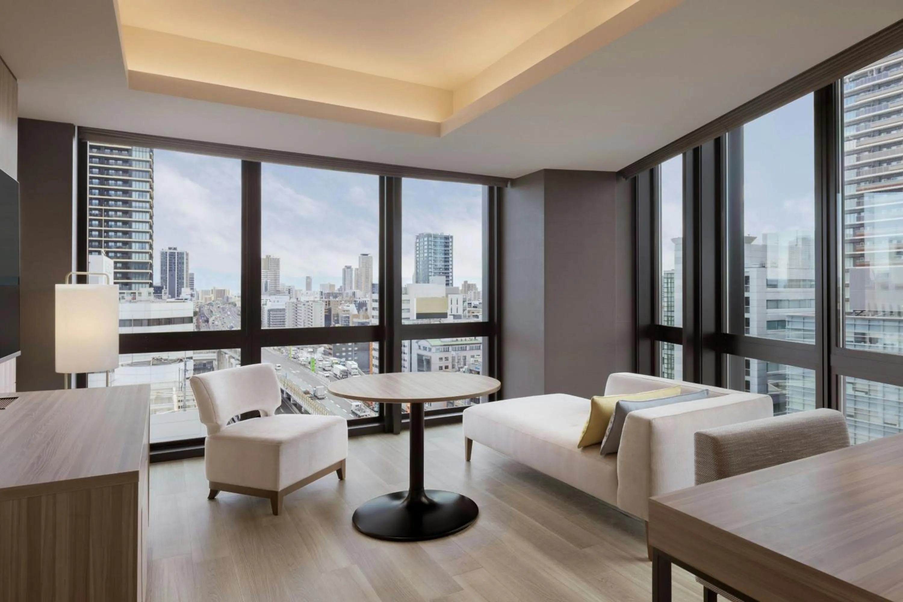 Living room in Courtyard by Marriott Osaka Honmachi