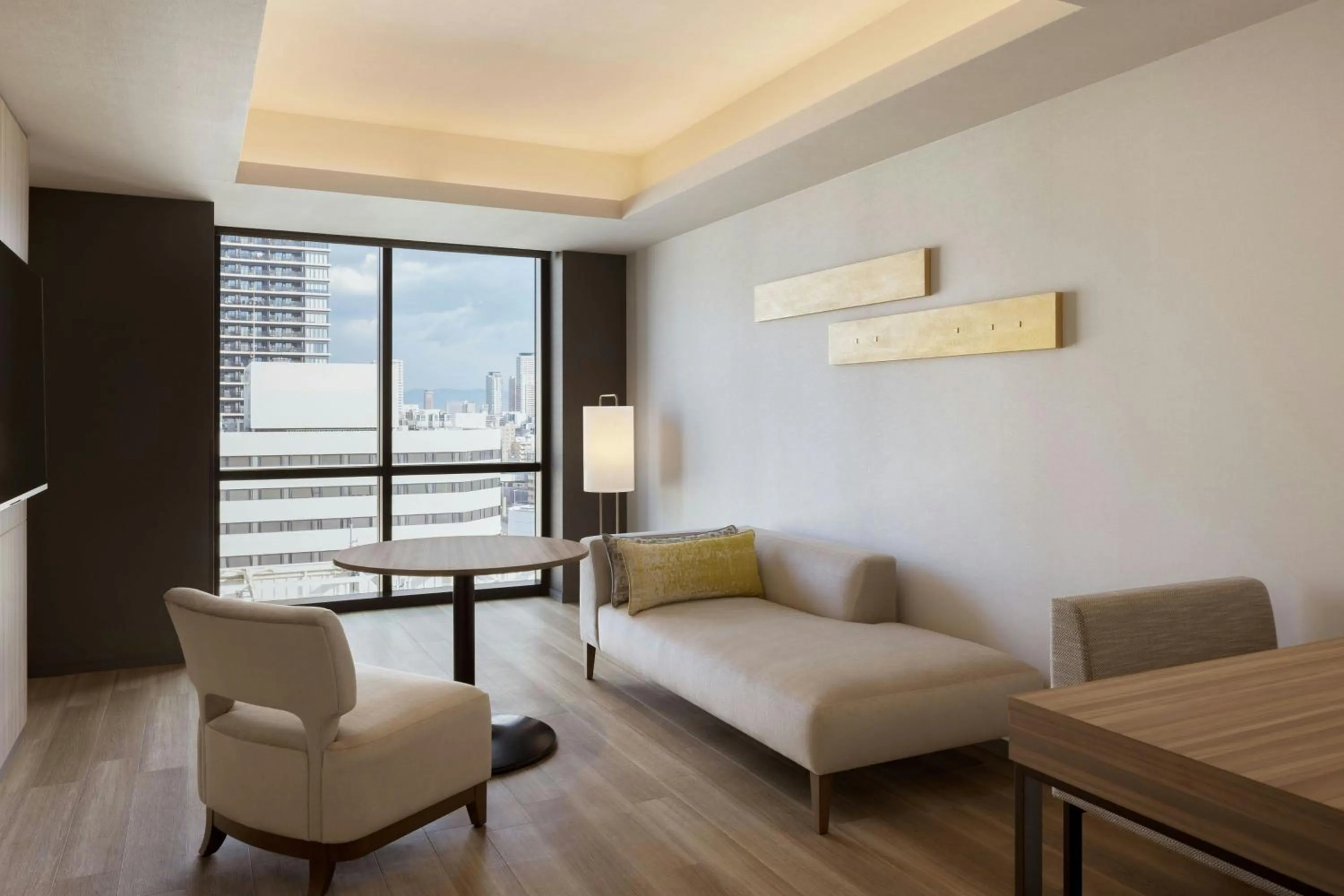 Living room in Courtyard by Marriott Osaka Honmachi