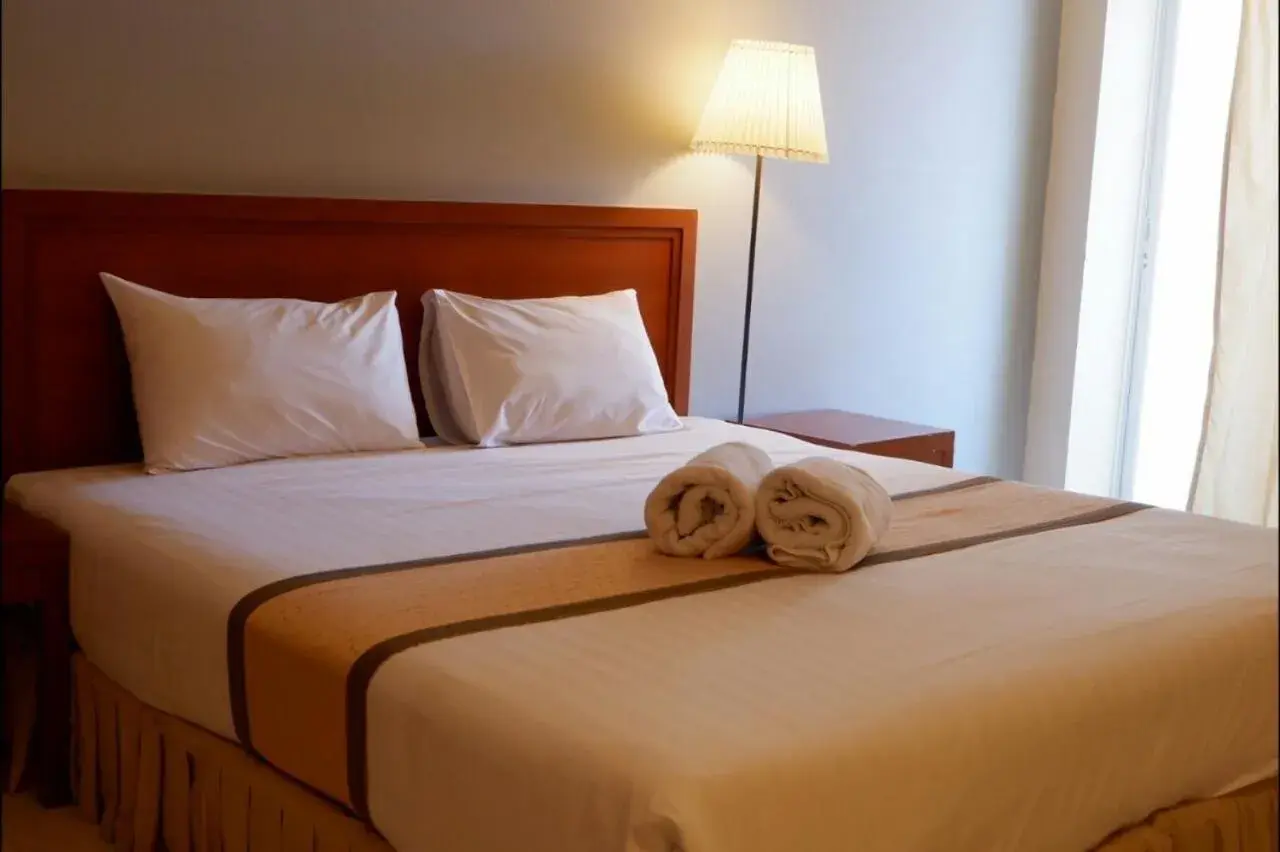 Bed in Phromsuk Hotel Ayutthaya Bed in Phromsuk Hotel Ayutthaya