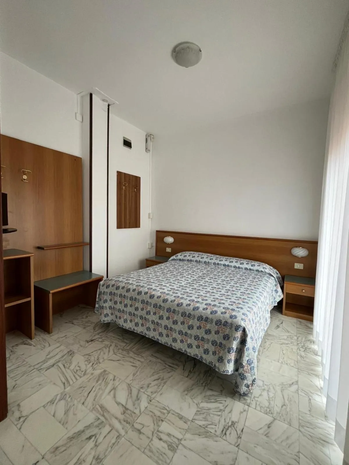 Bed in Hotel Valentino