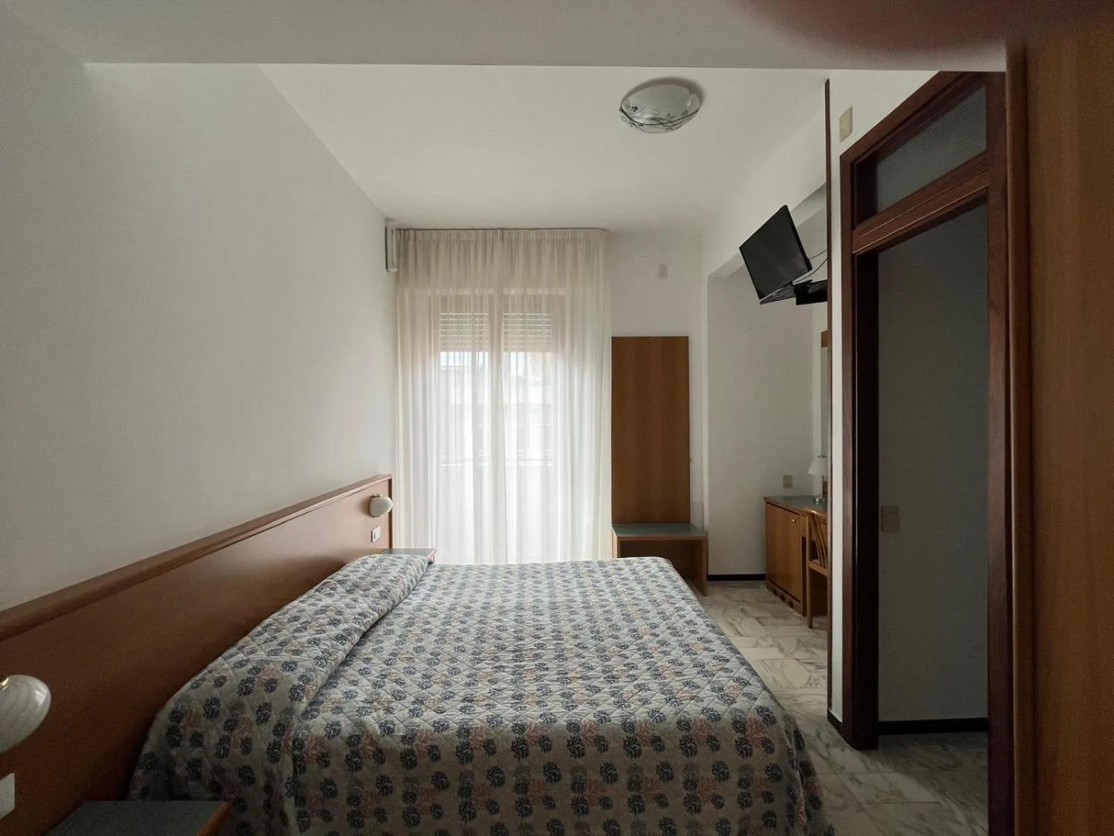 Bed in Hotel Valentino