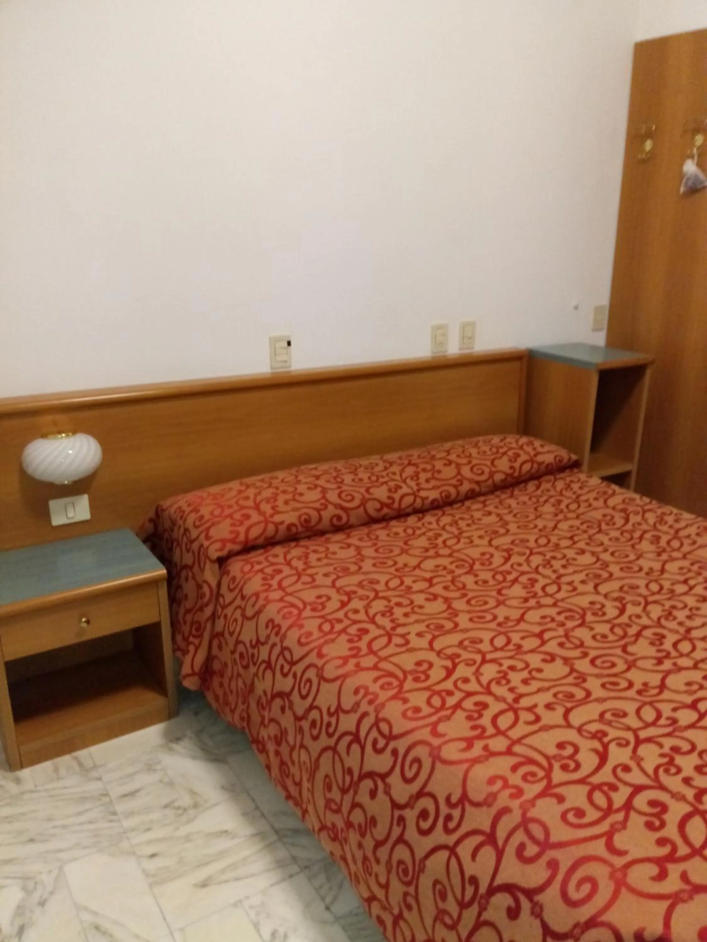 Bed in Hotel Valentino