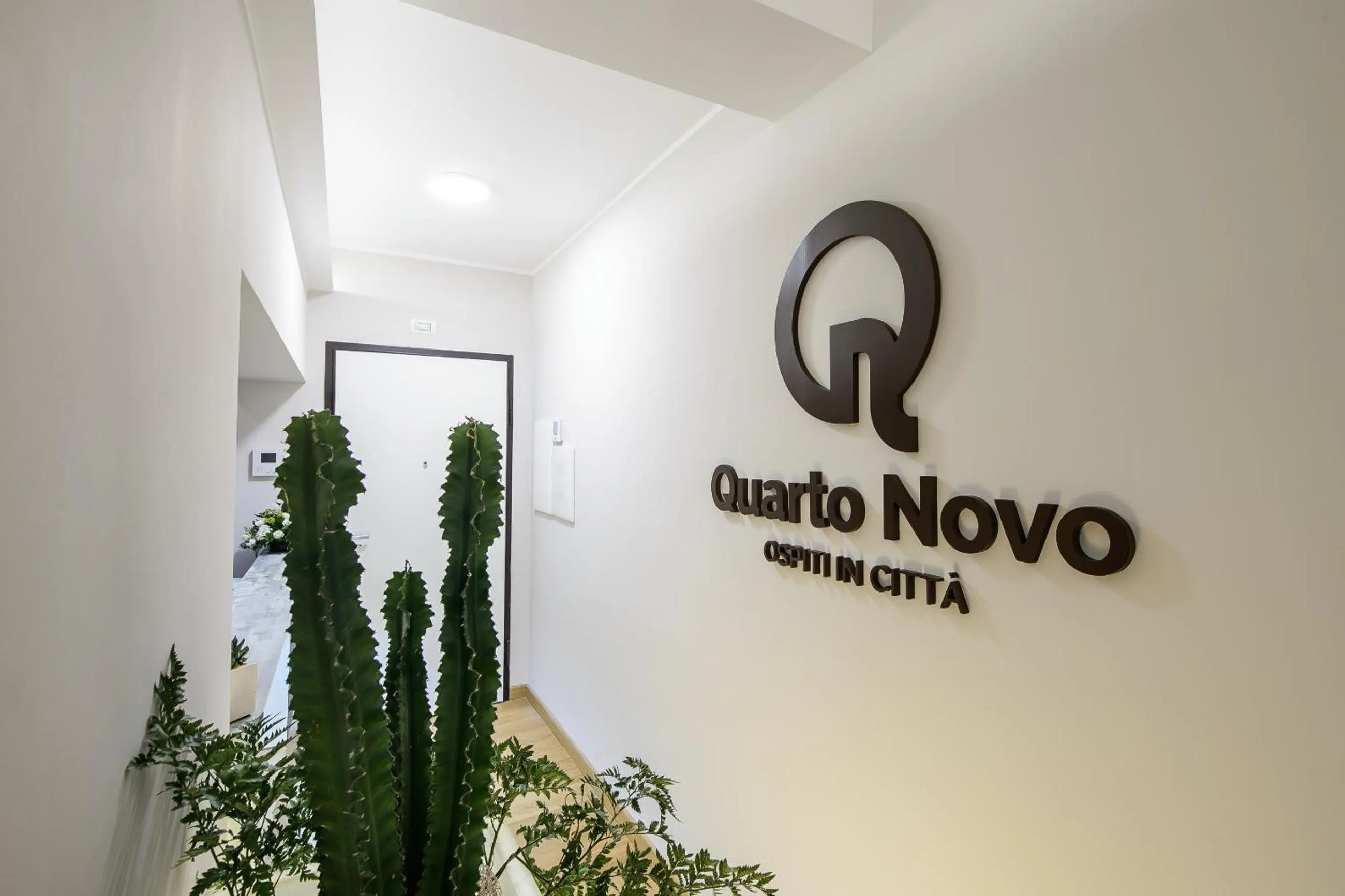Property logo or sign in Quarto Novo Suite