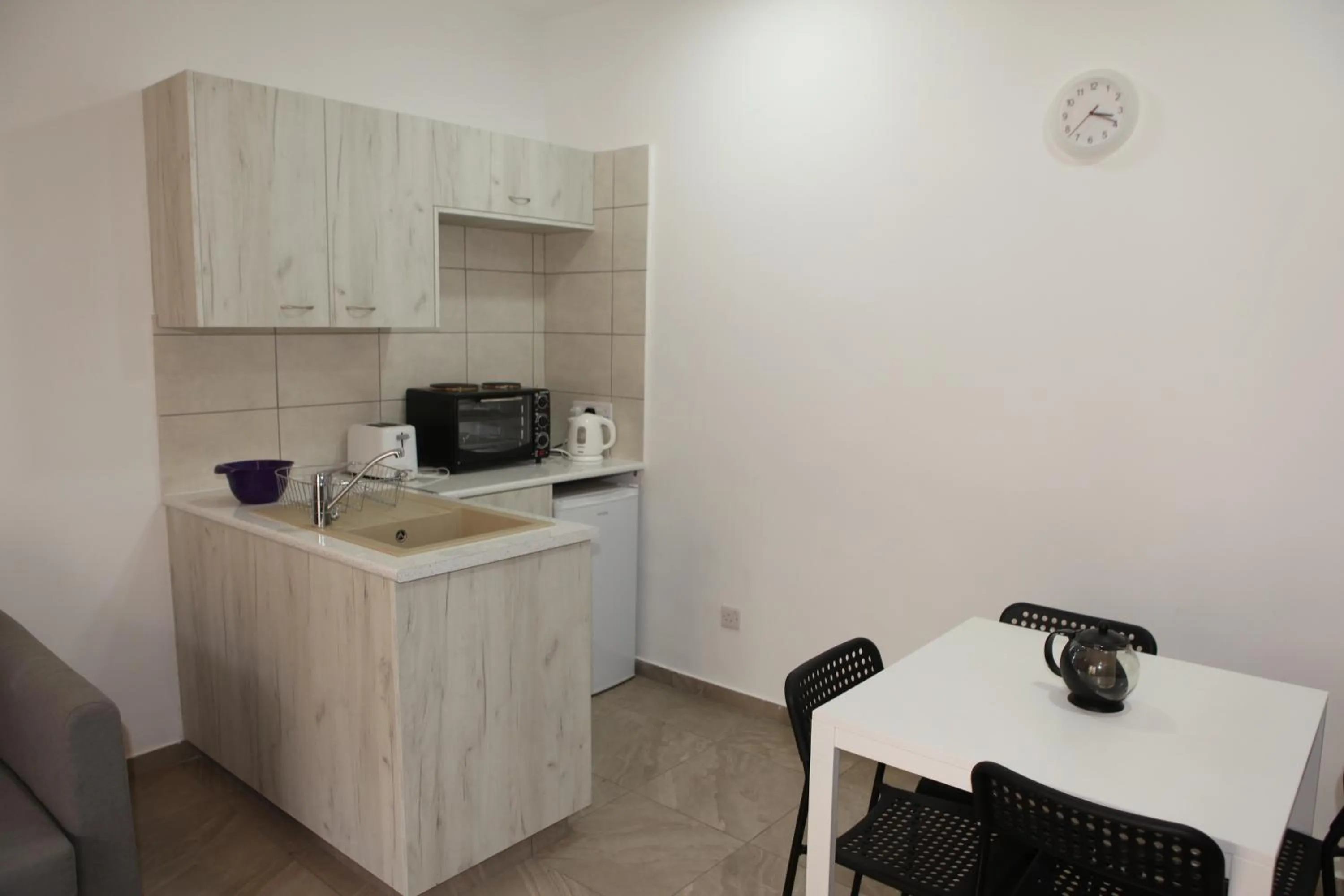 Kitchen or kitchenette in Polyxeni Hotel Apartments