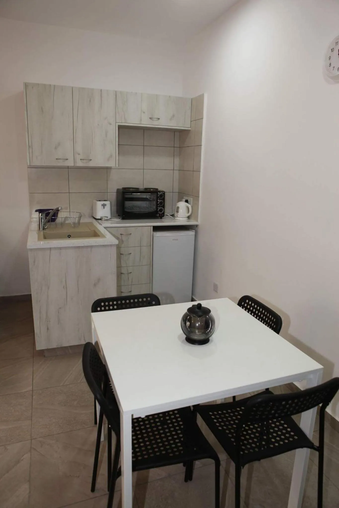 Kitchen or kitchenette in Polyxeni Hotel Apartments