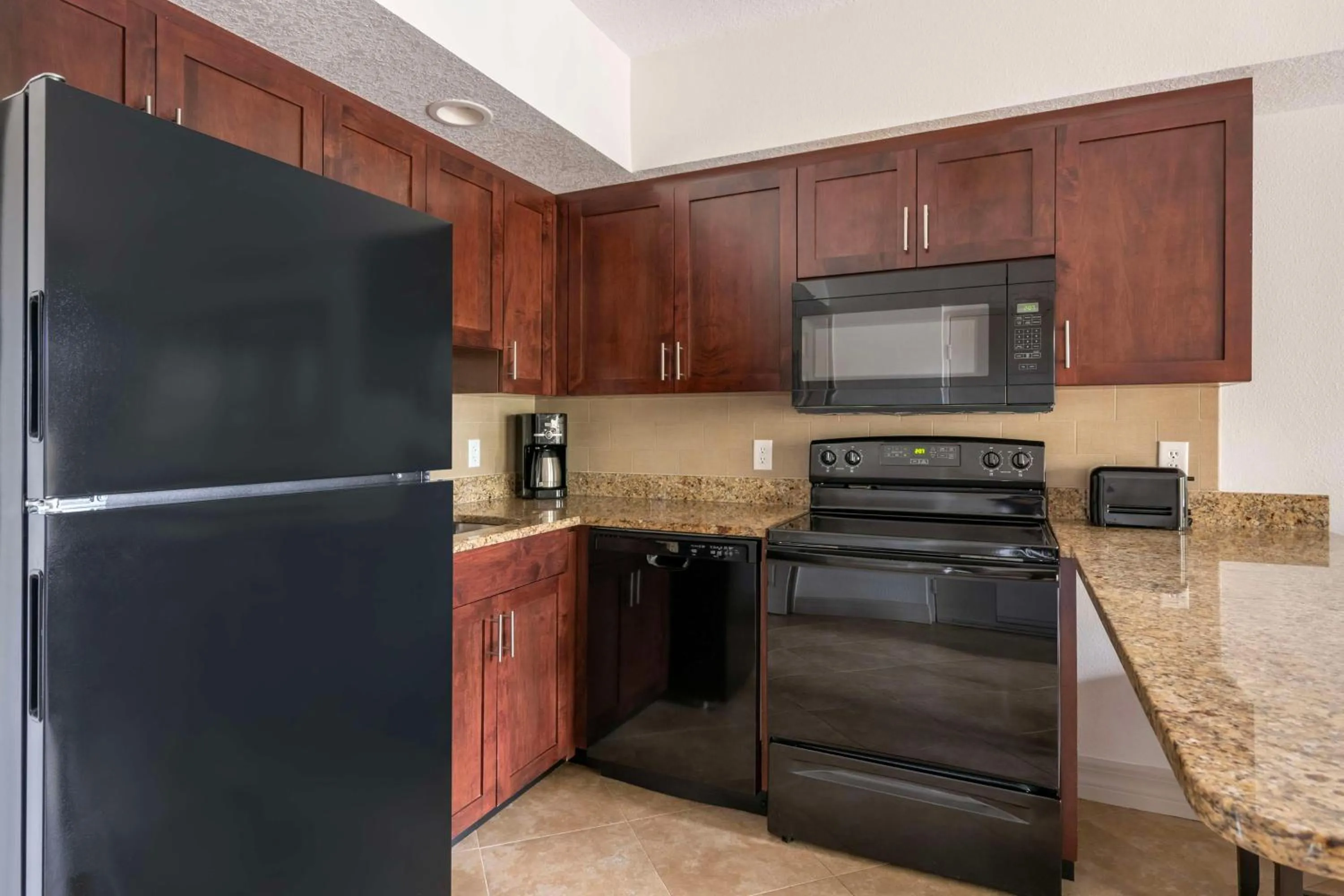Kitchen or kitchenette in Hilton Vacation Club Aqua Sol Orlando West