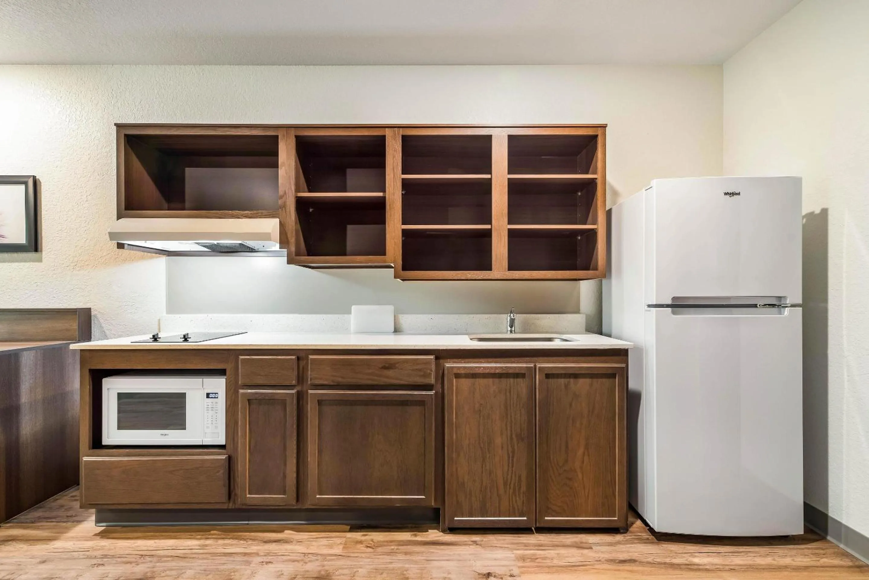 Bedroom in WoodSpring Suites Davenport FL