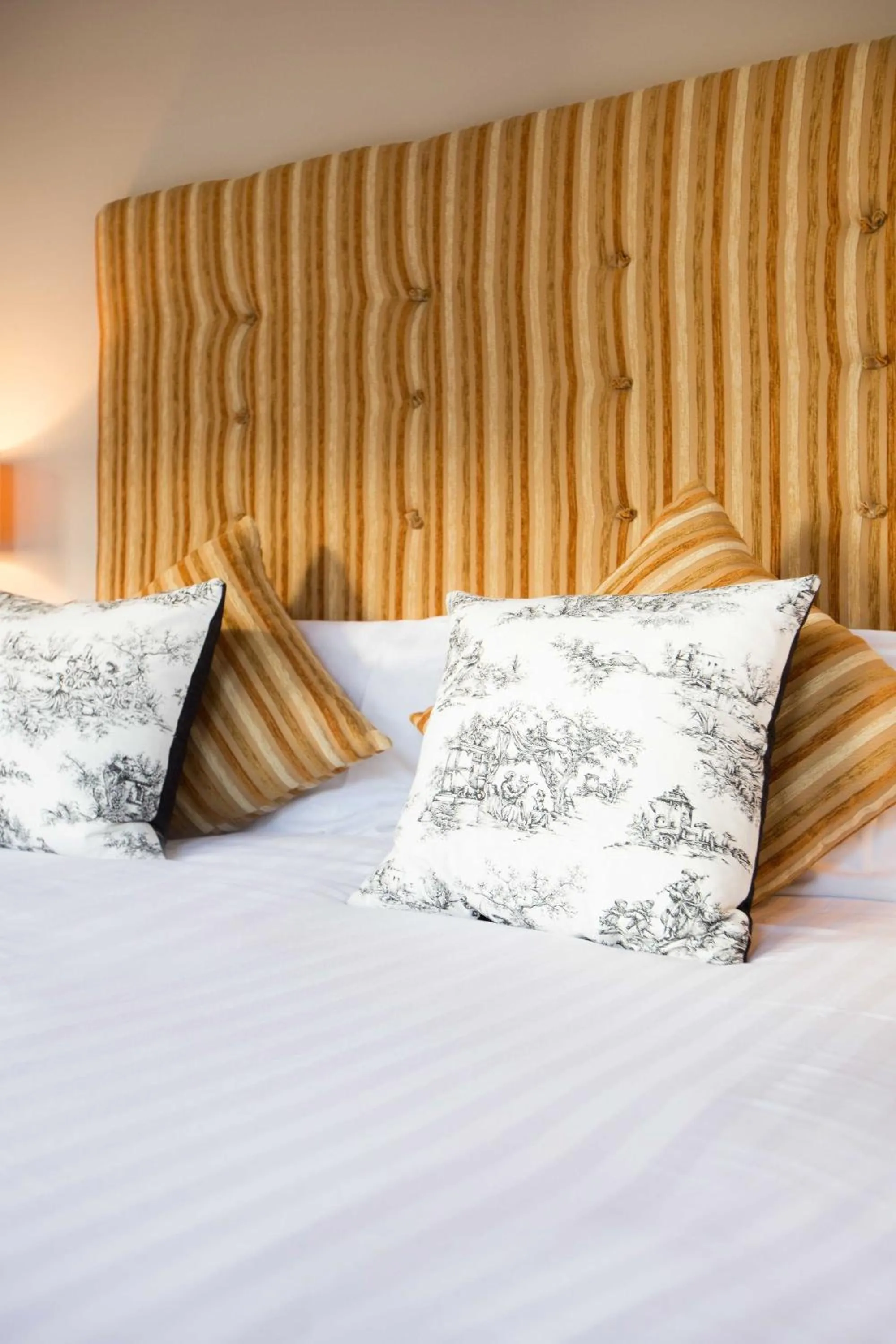 Bed in OX Hotel, Bar, & Grill