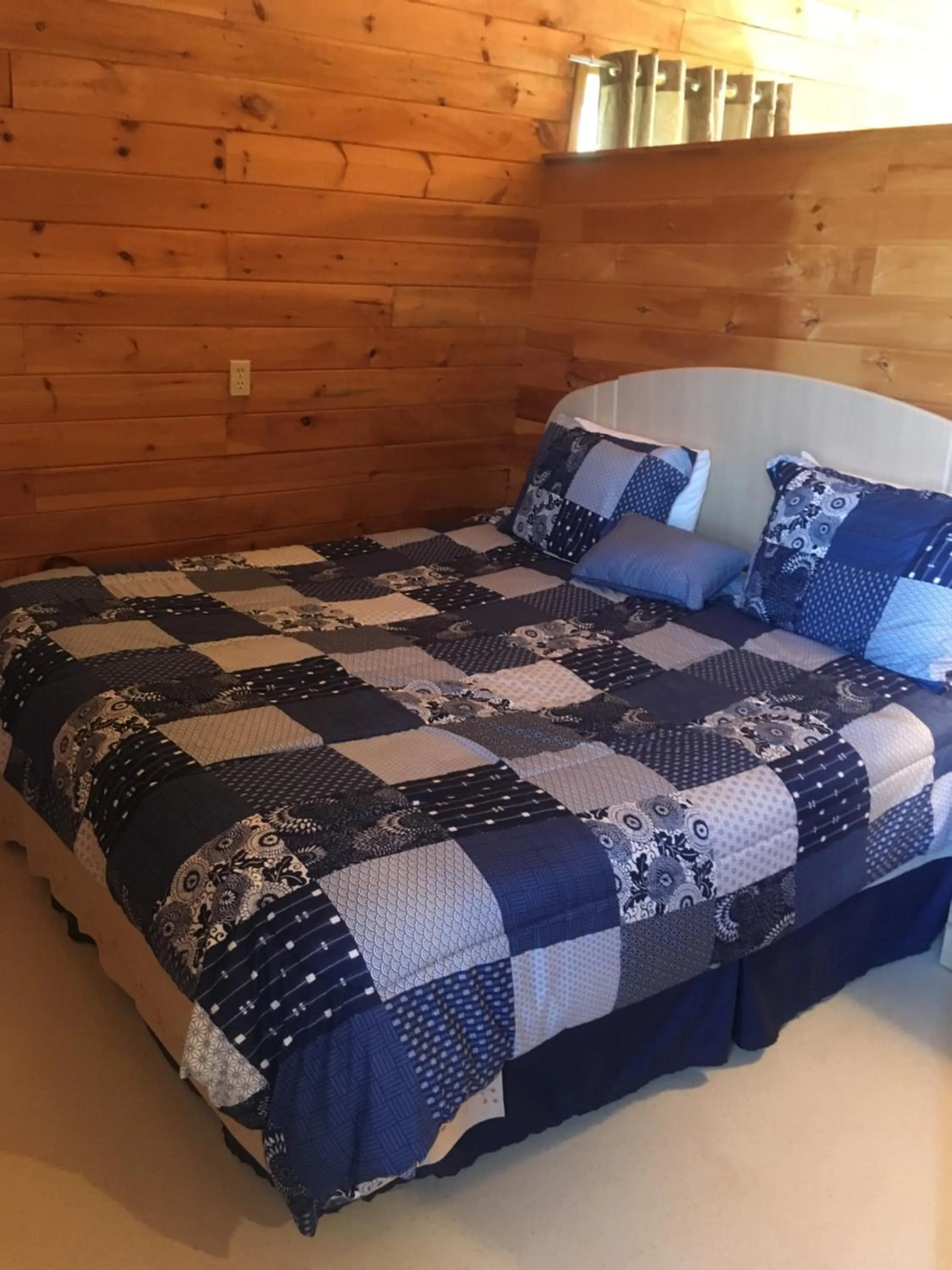 Bed in Baywatch Lighthouse Cottages & Motel