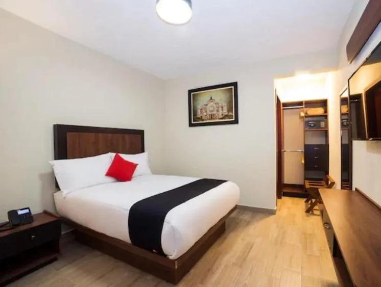 Bed in Hotel Colonial Acopinalco Inn