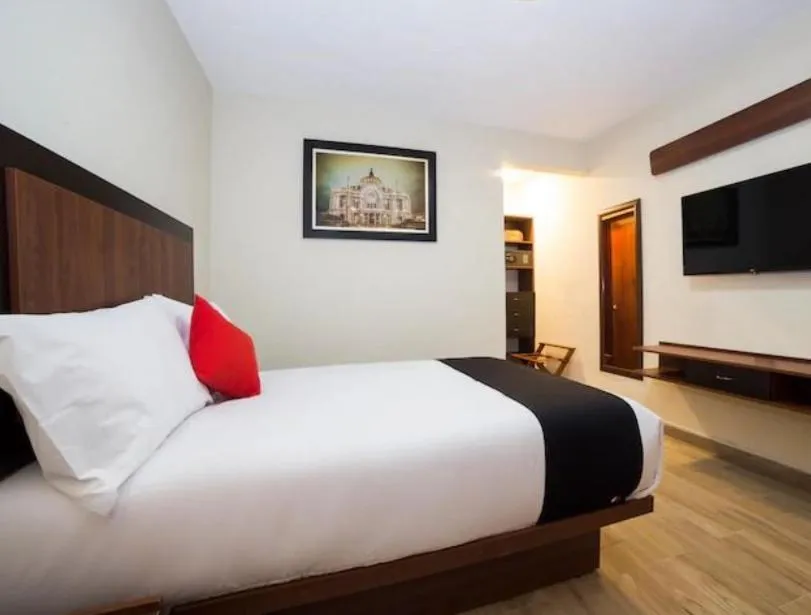 Bed in Hotel Colonial Acopinalco Inn