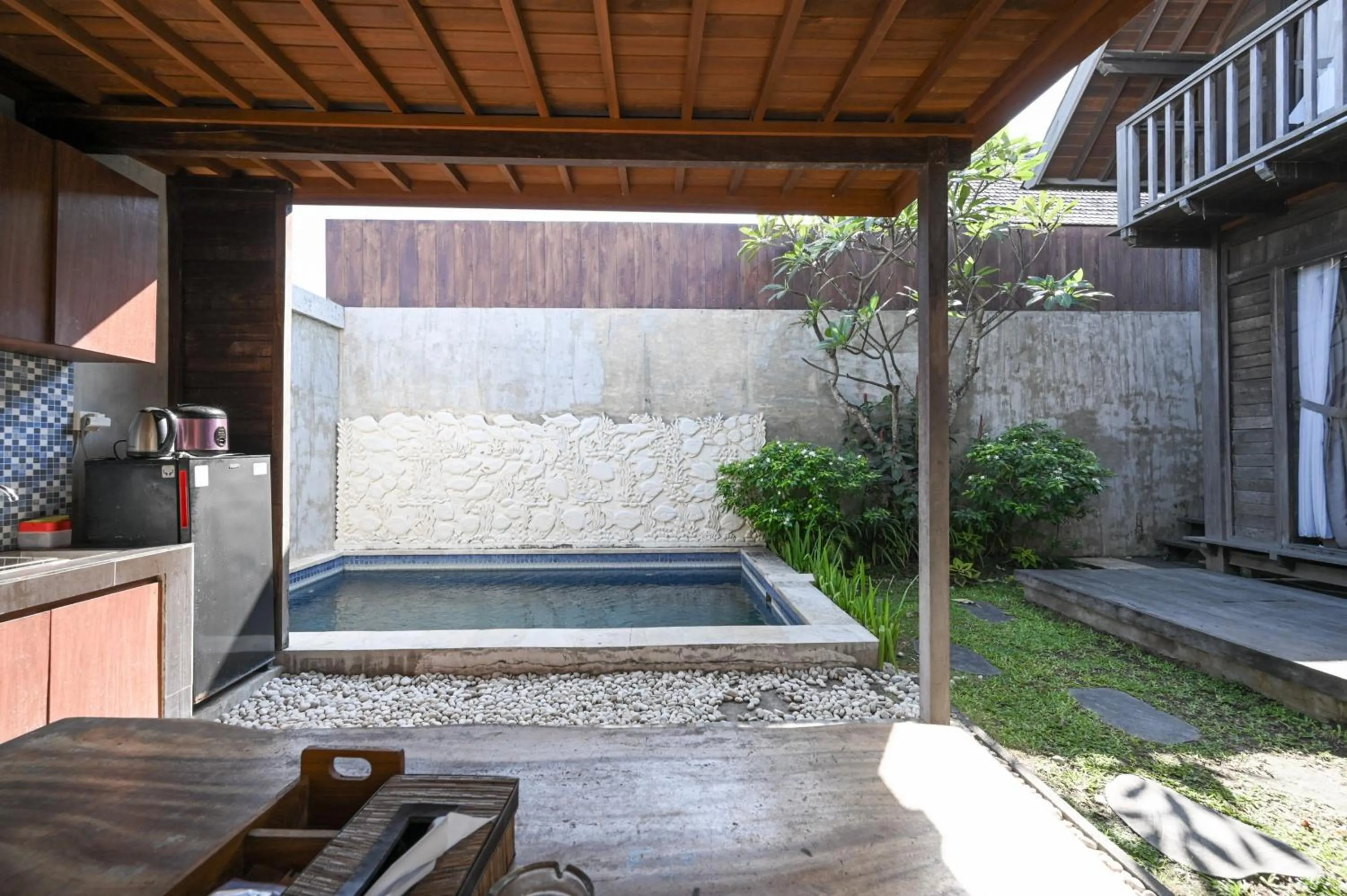 Kitchen or kitchenette in Hoki Villa by Urbanview Villa