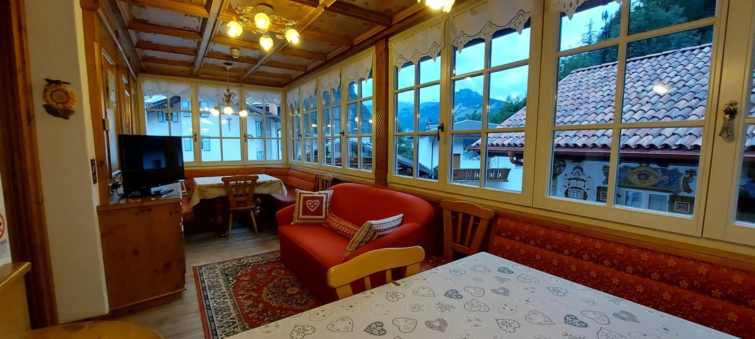 Communal lounge/ TV room in Garnì Stella Alpina