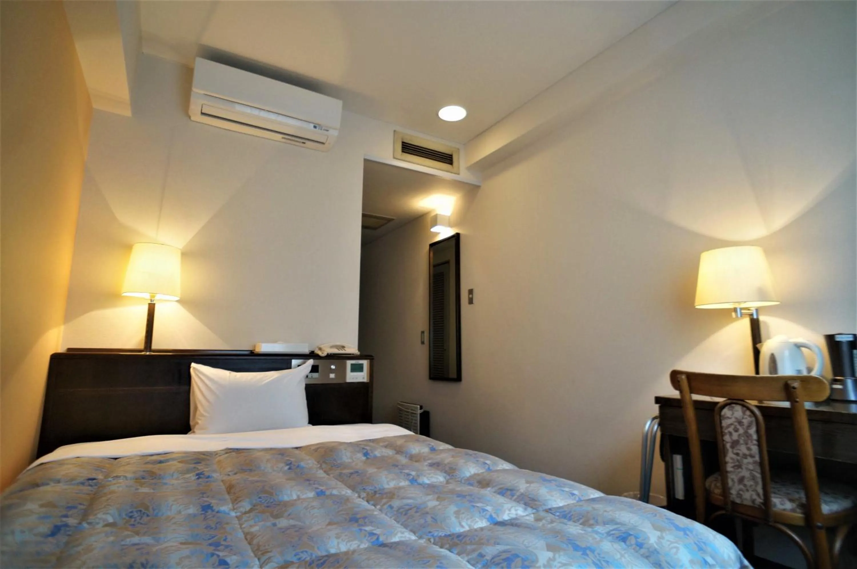 Bed in Hotel Welcome Matsumoto