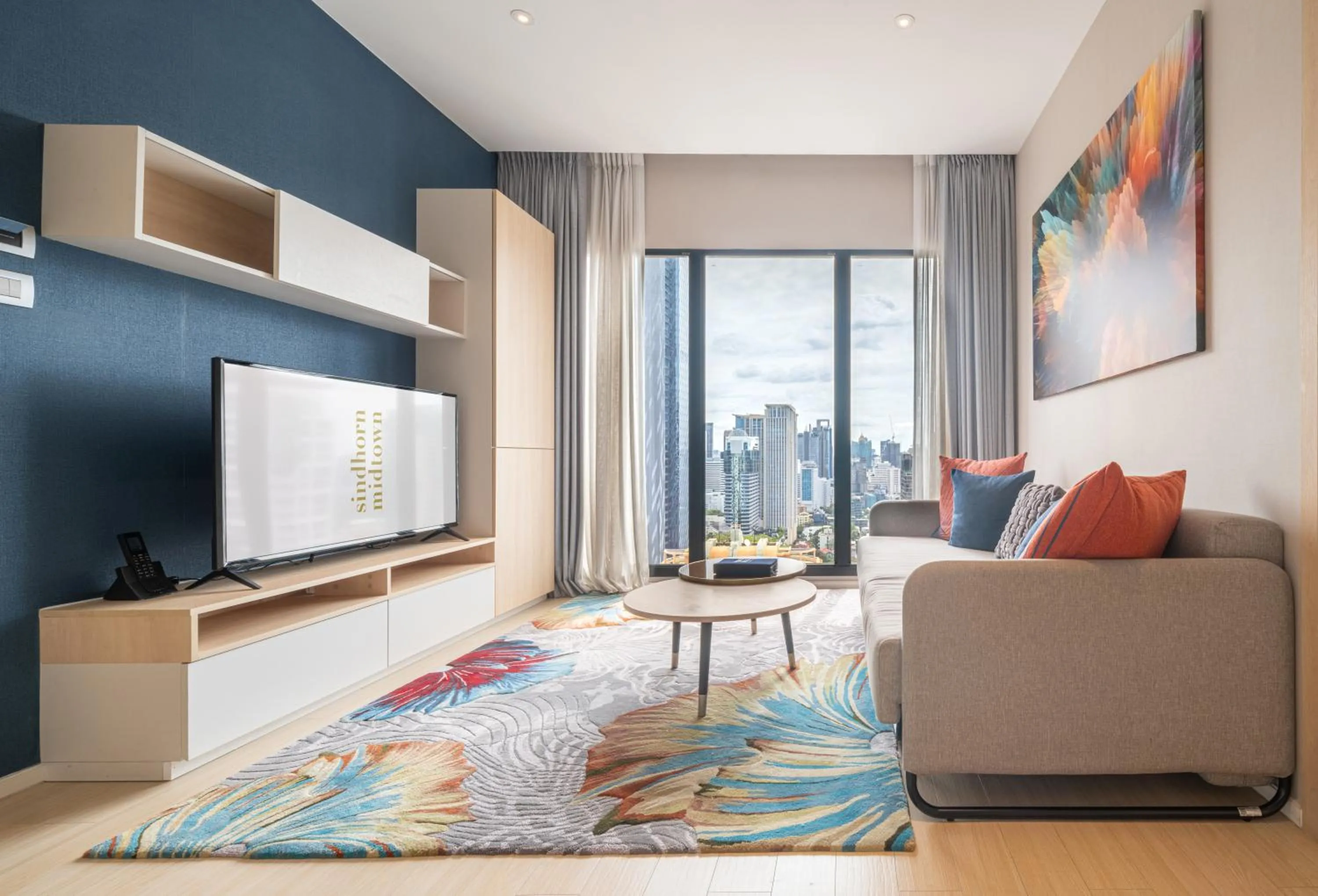 Communal lounge/ TV room in Sindhorn Midtown Hotel Bangkok, Vignette Collection by IHG