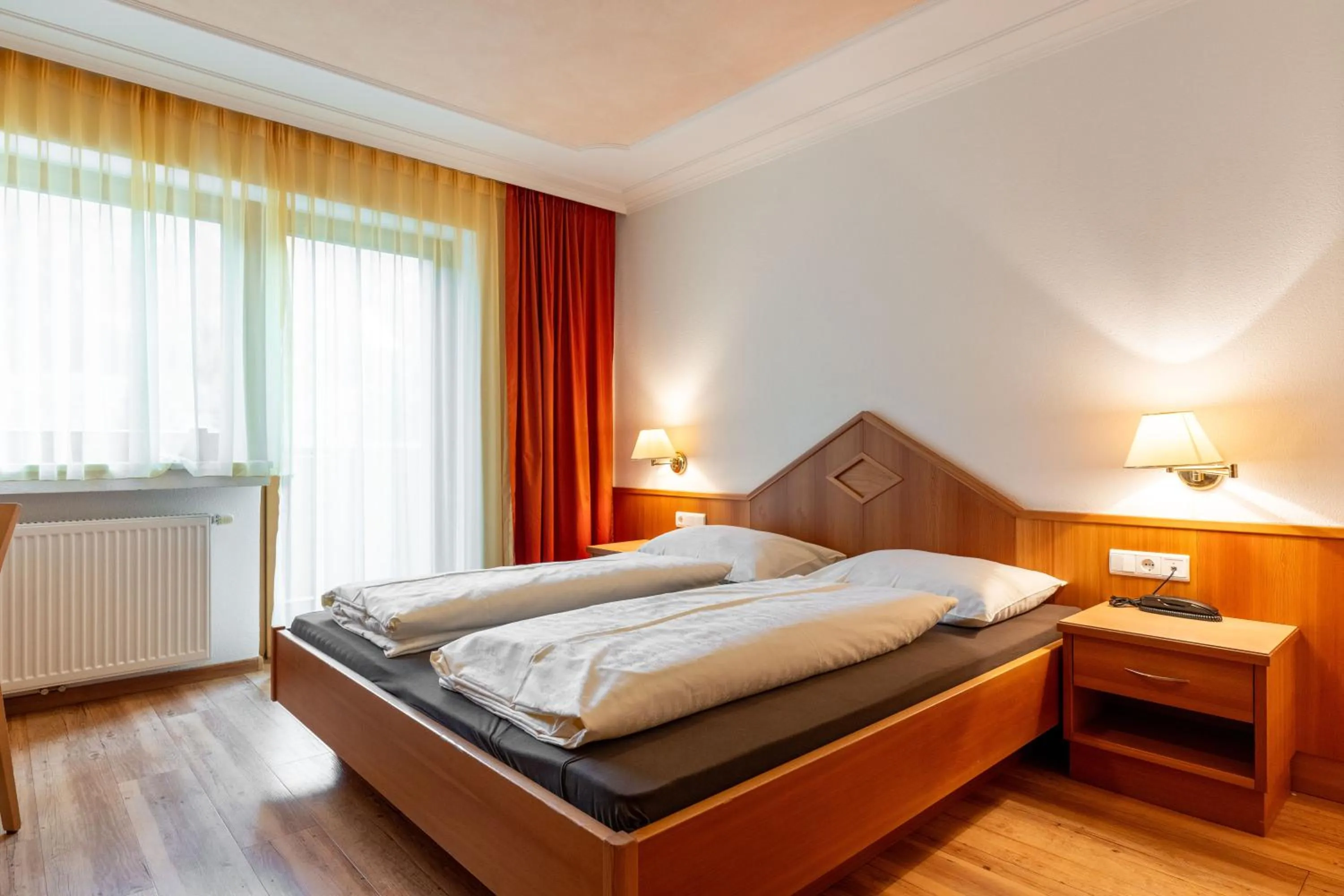 Bed in Hotel Tannenhof