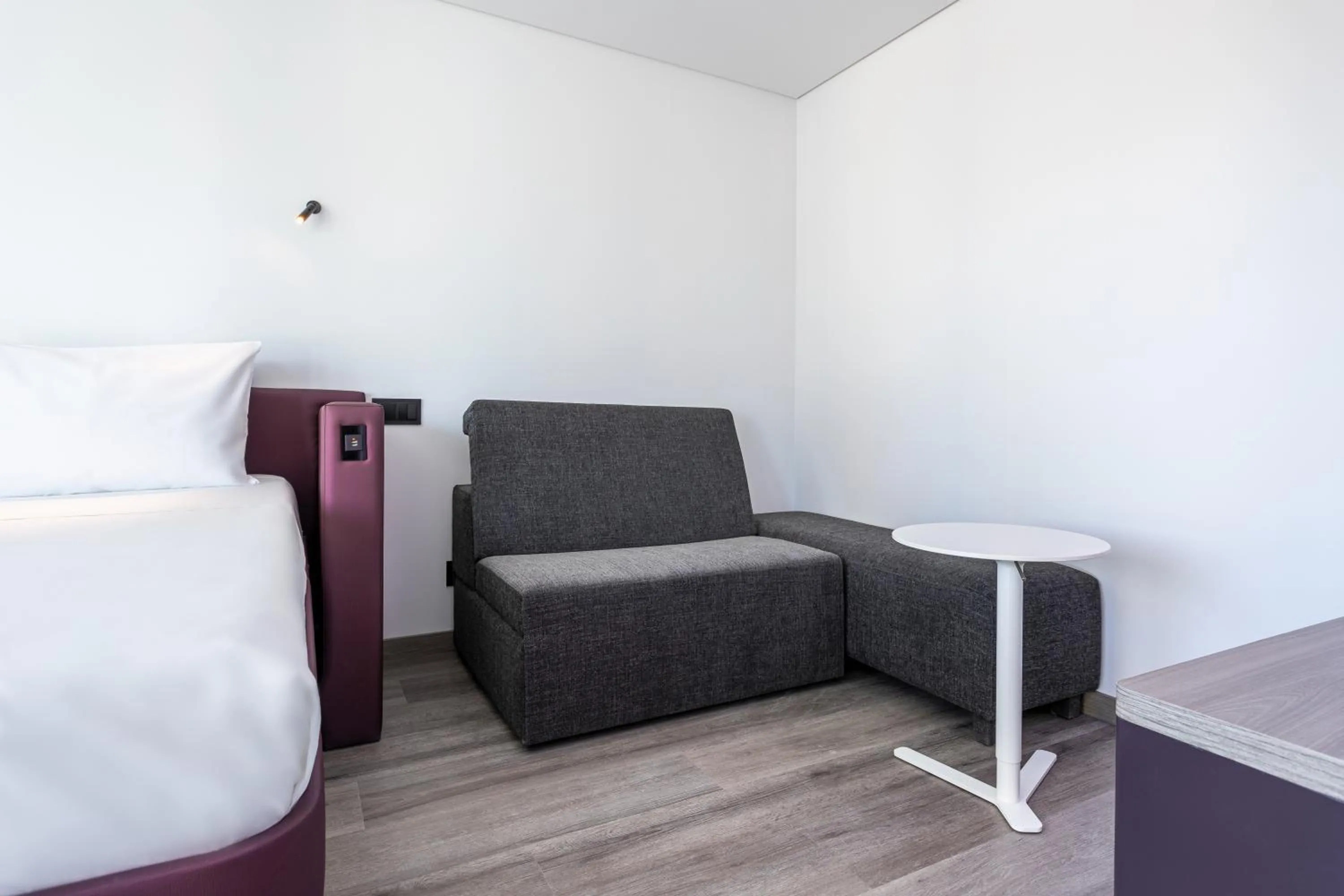 Seating area, Bed in YOTEL Porto