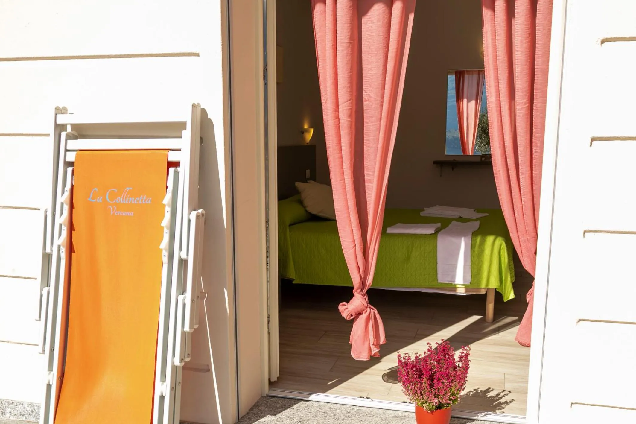 Bedroom in La Collinetta Apartments
