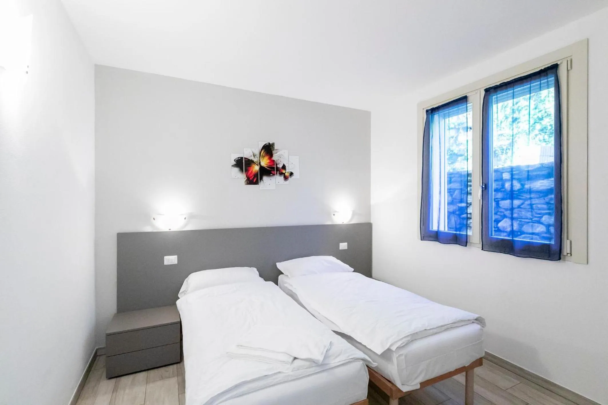 Bedroom in La Collinetta Apartments