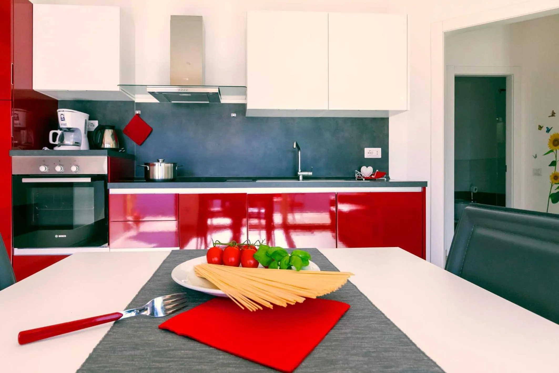 Kitchen or kitchenette in La Collinetta Apartments