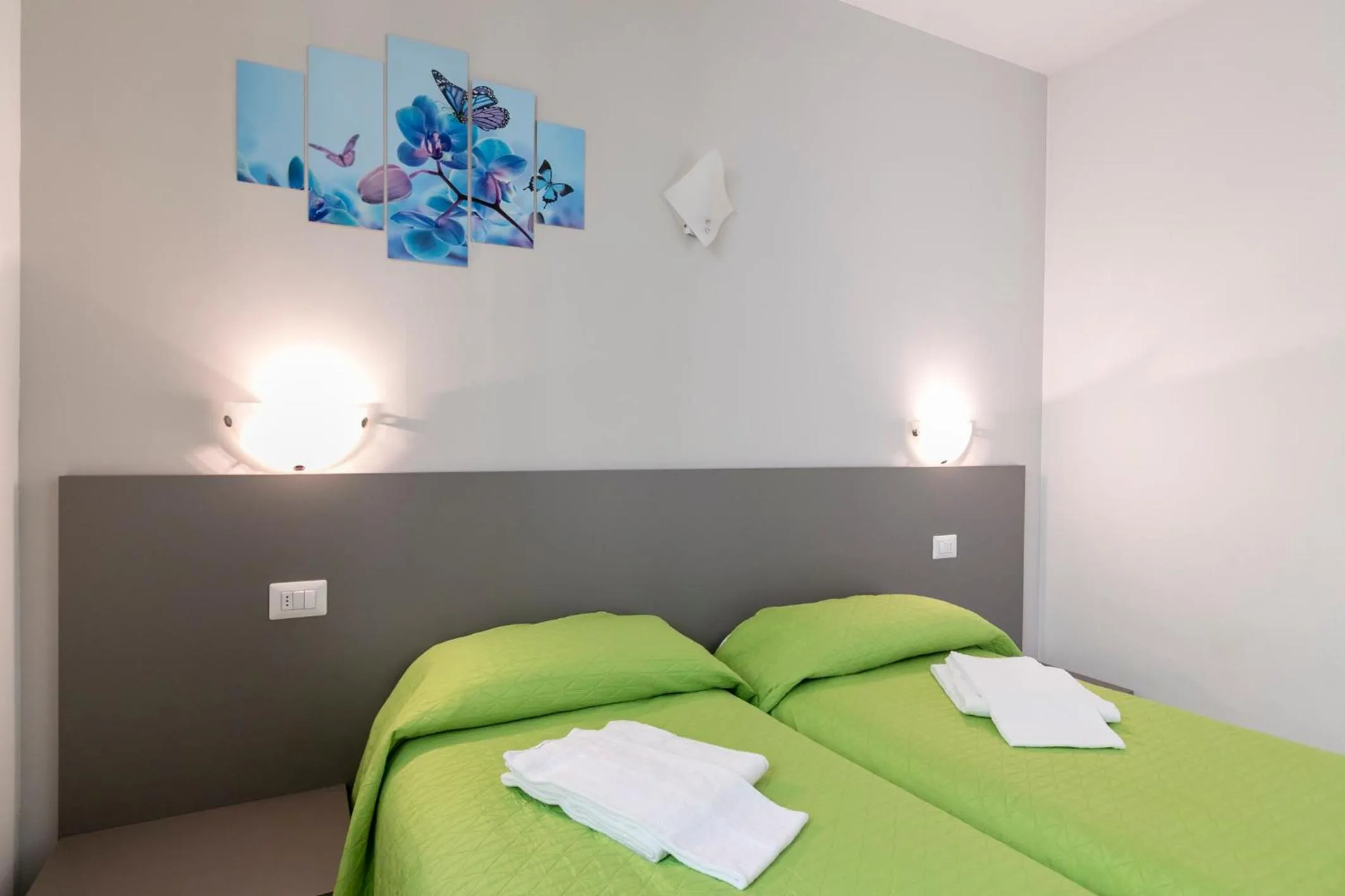 Bedroom in La Collinetta Apartments