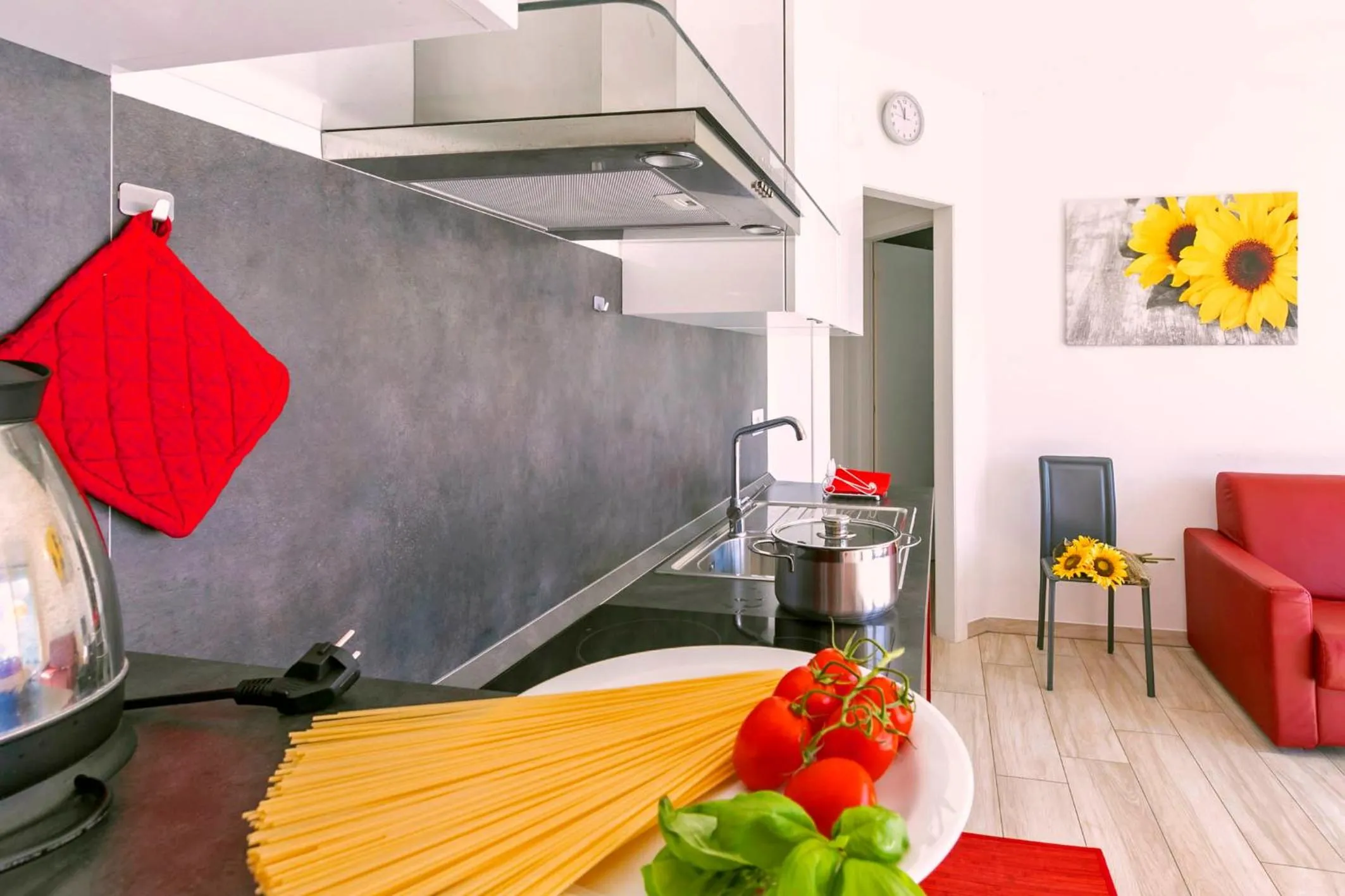 Kitchen or kitchenette in La Collinetta Apartments