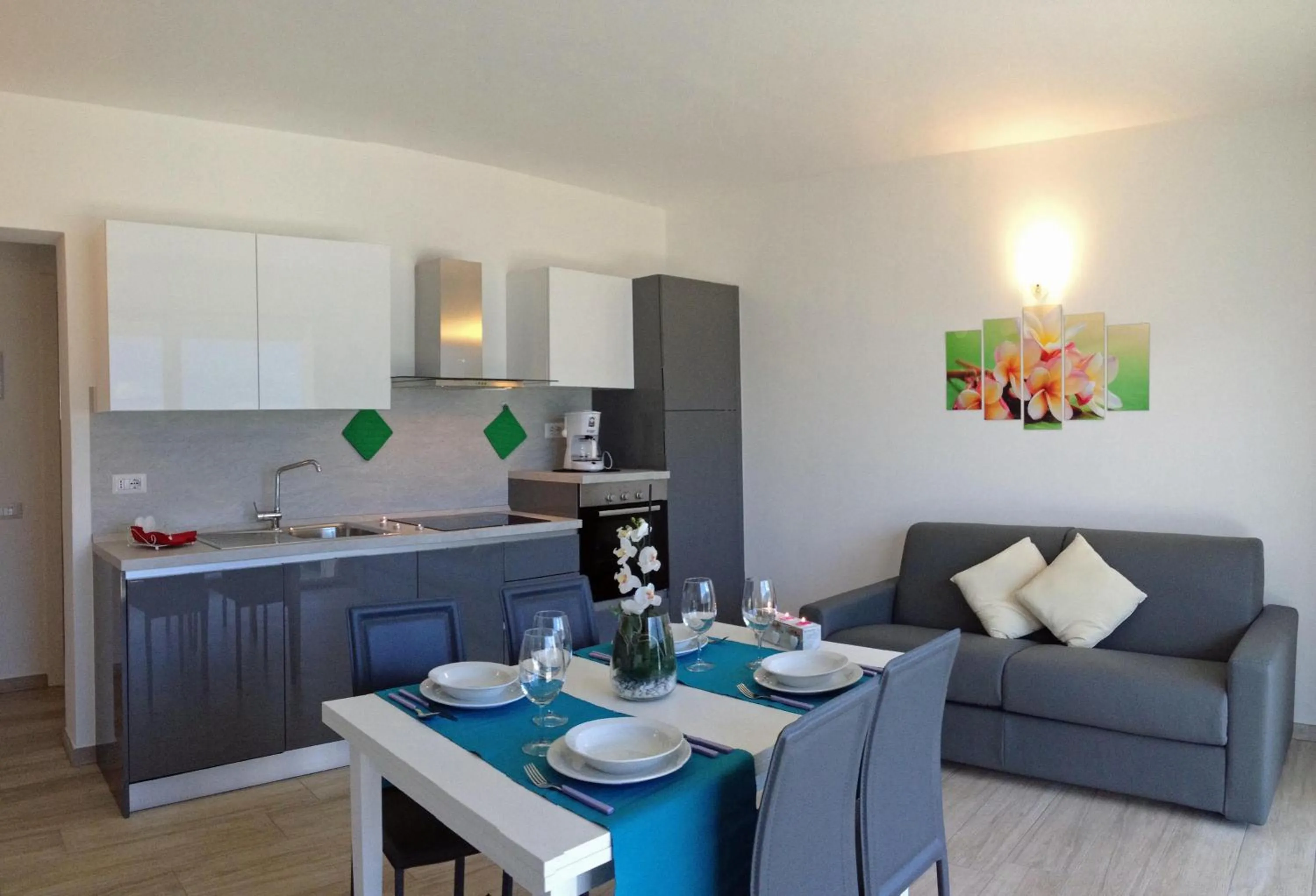 Kitchen or kitchenette in La Collinetta Apartments