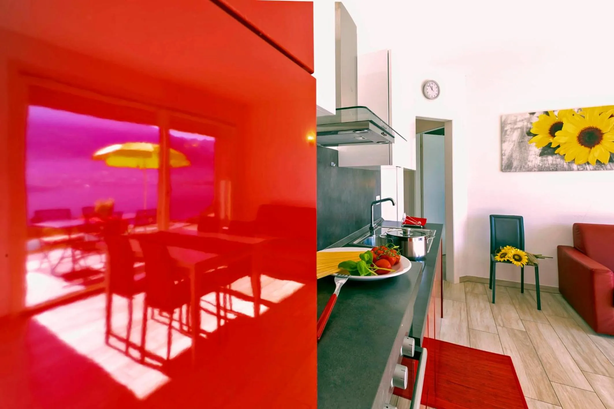 Kitchen or kitchenette in La Collinetta Apartments