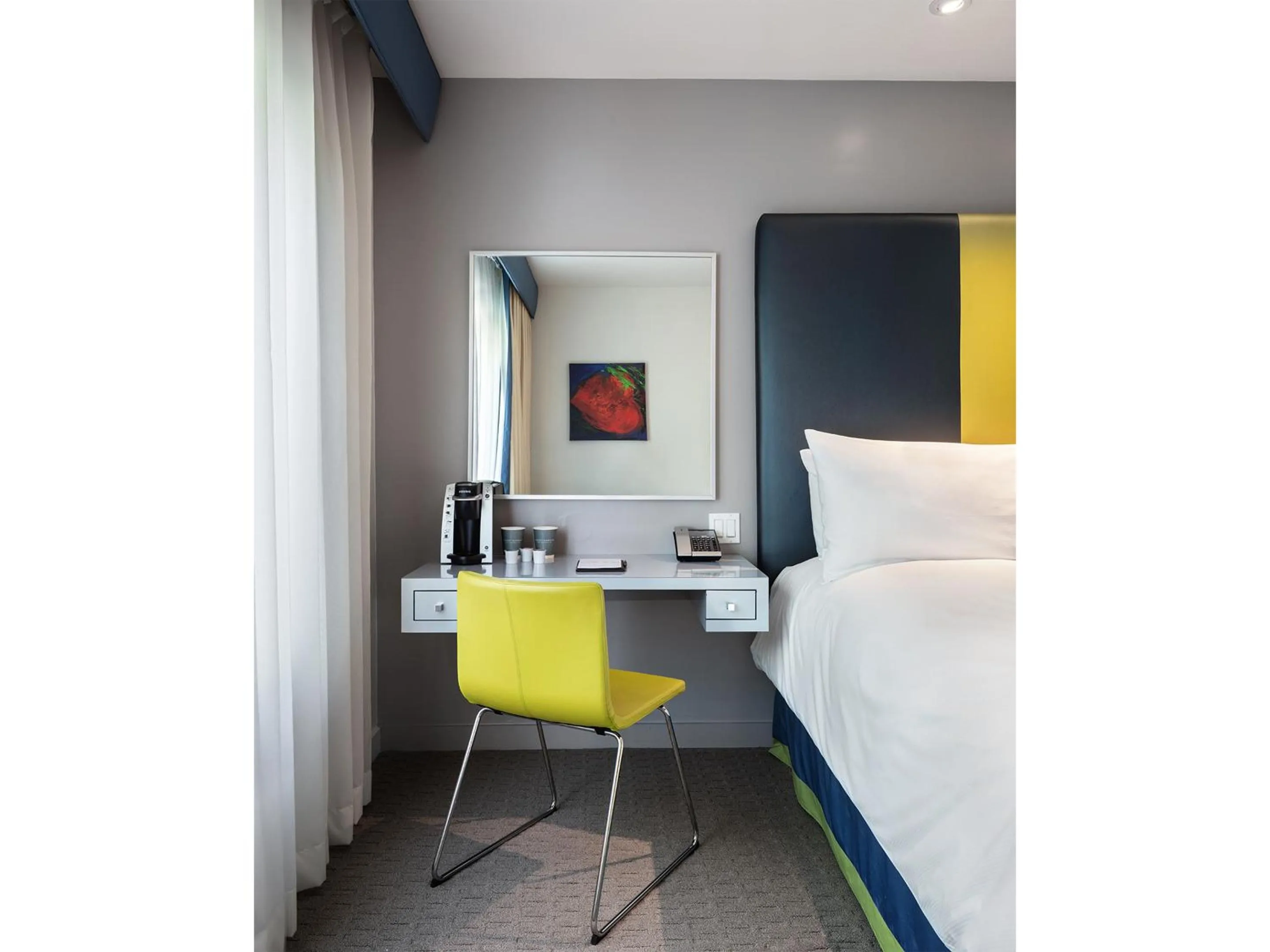 Bed in Sunset Marquis Hotel