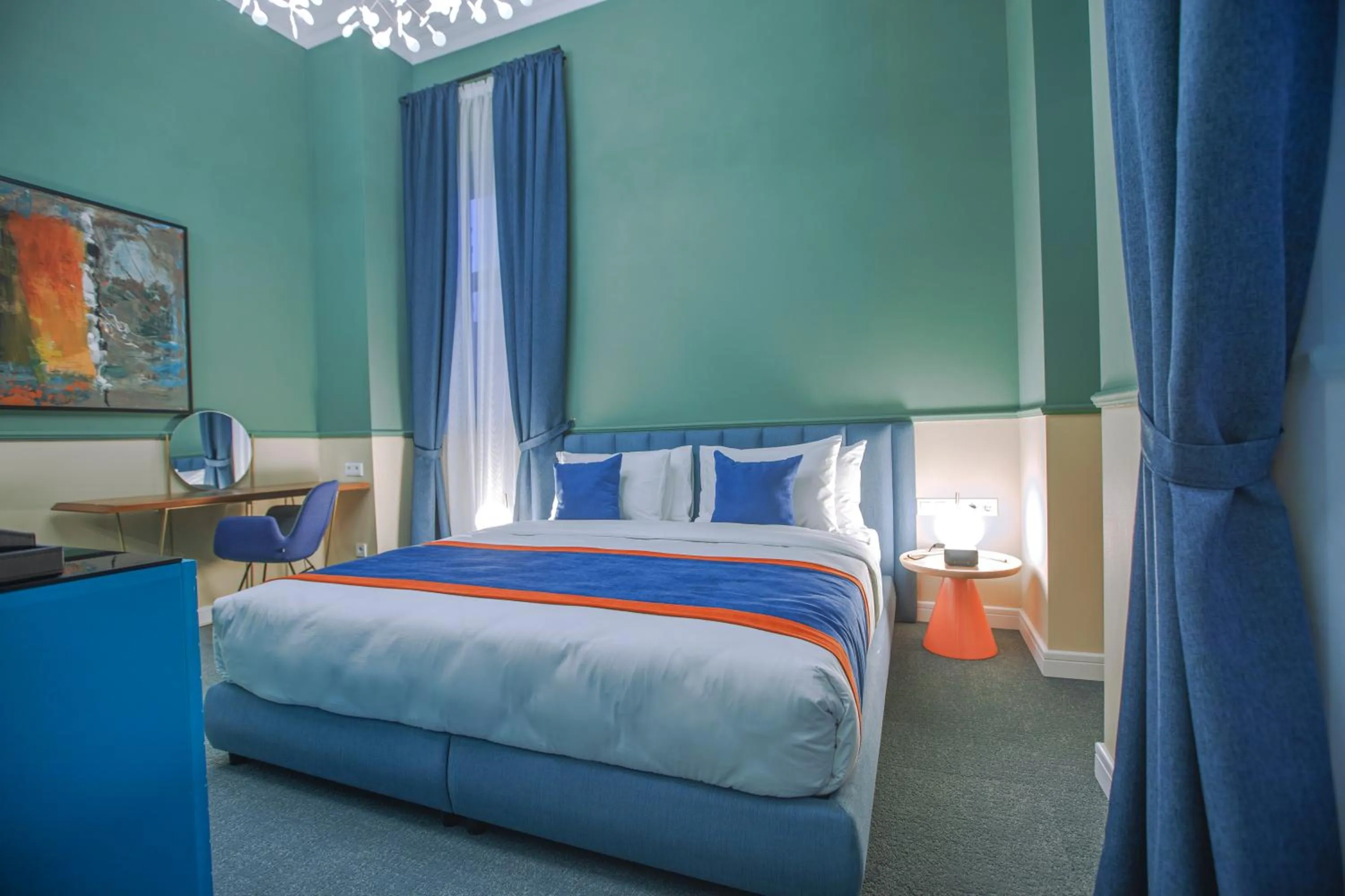 Bed in Heritage Hotel and Suites