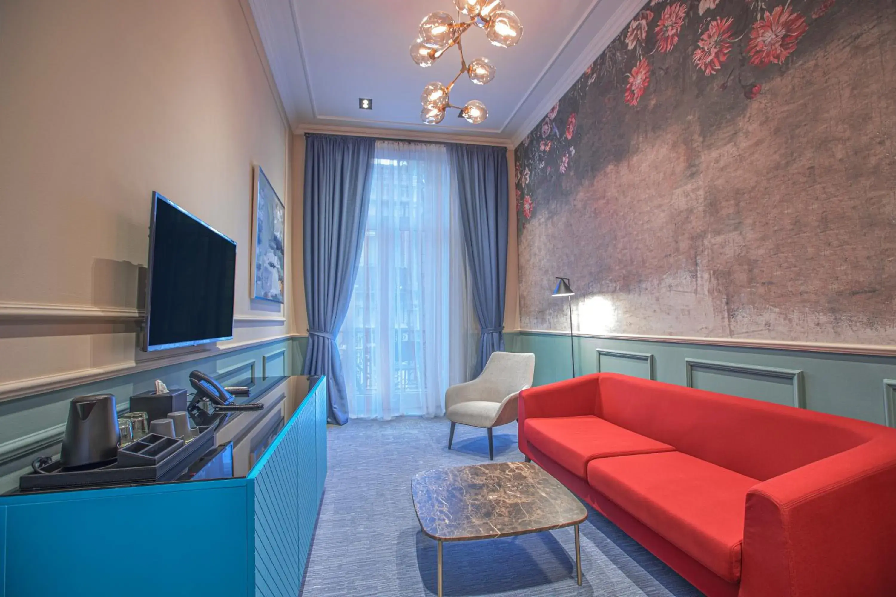 Living room in Heritage Hotel and Suites Living room in Heritage Hotel and Suites