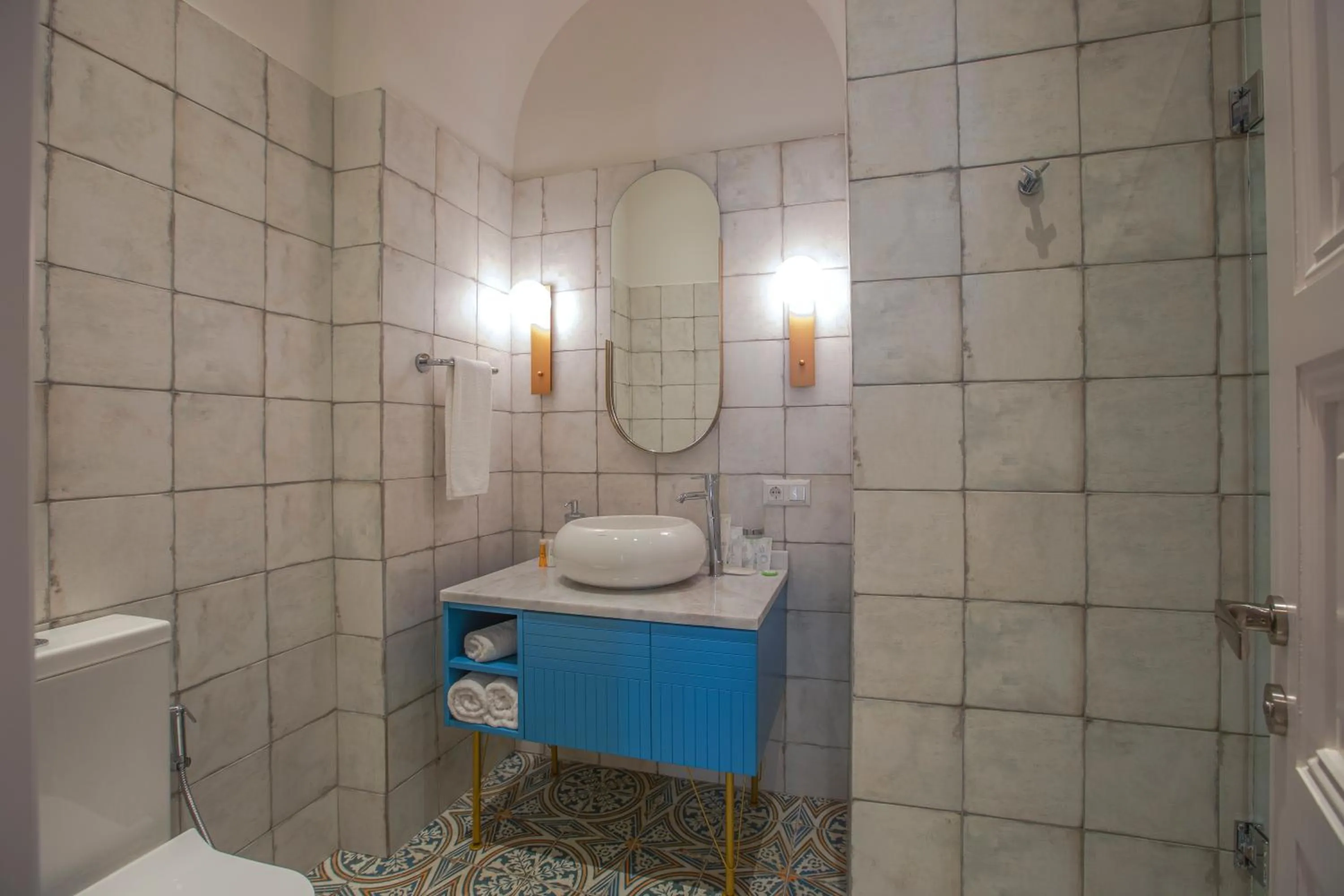 Bathroom in Heritage Hotel and Suites