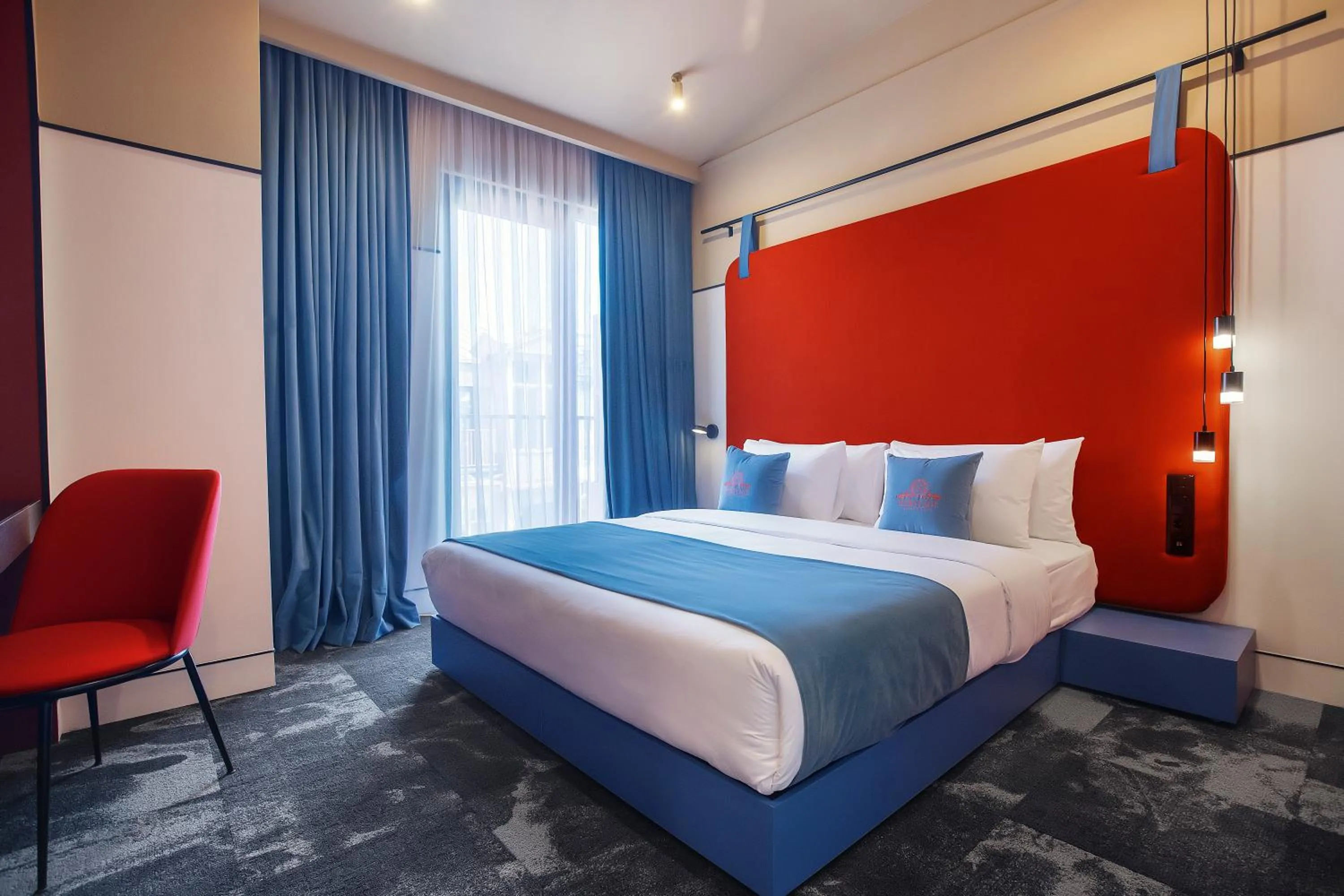 Bed in Heritage Hotel and Suites