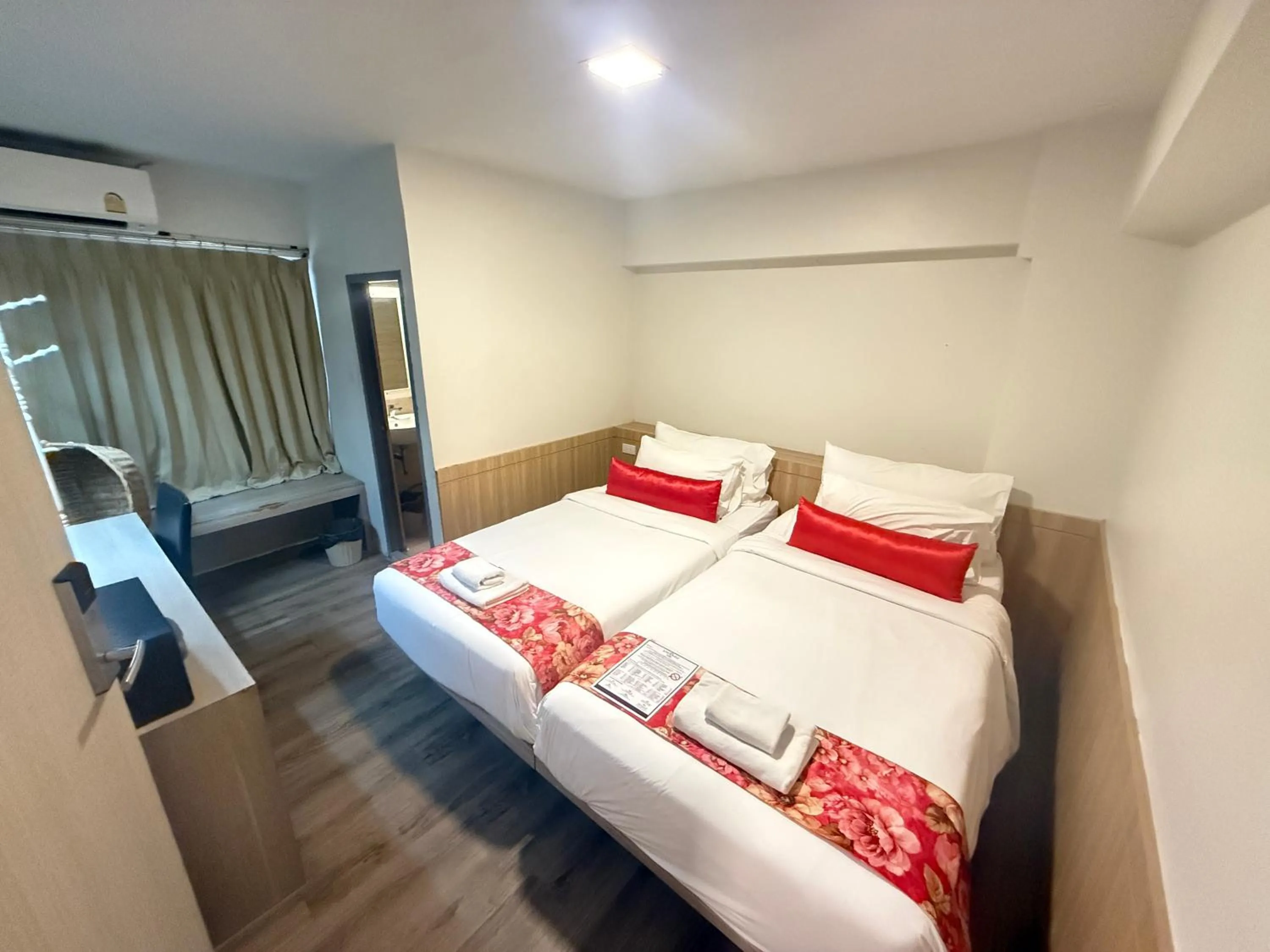 Bed in Wild Orchid Villa Bangkok