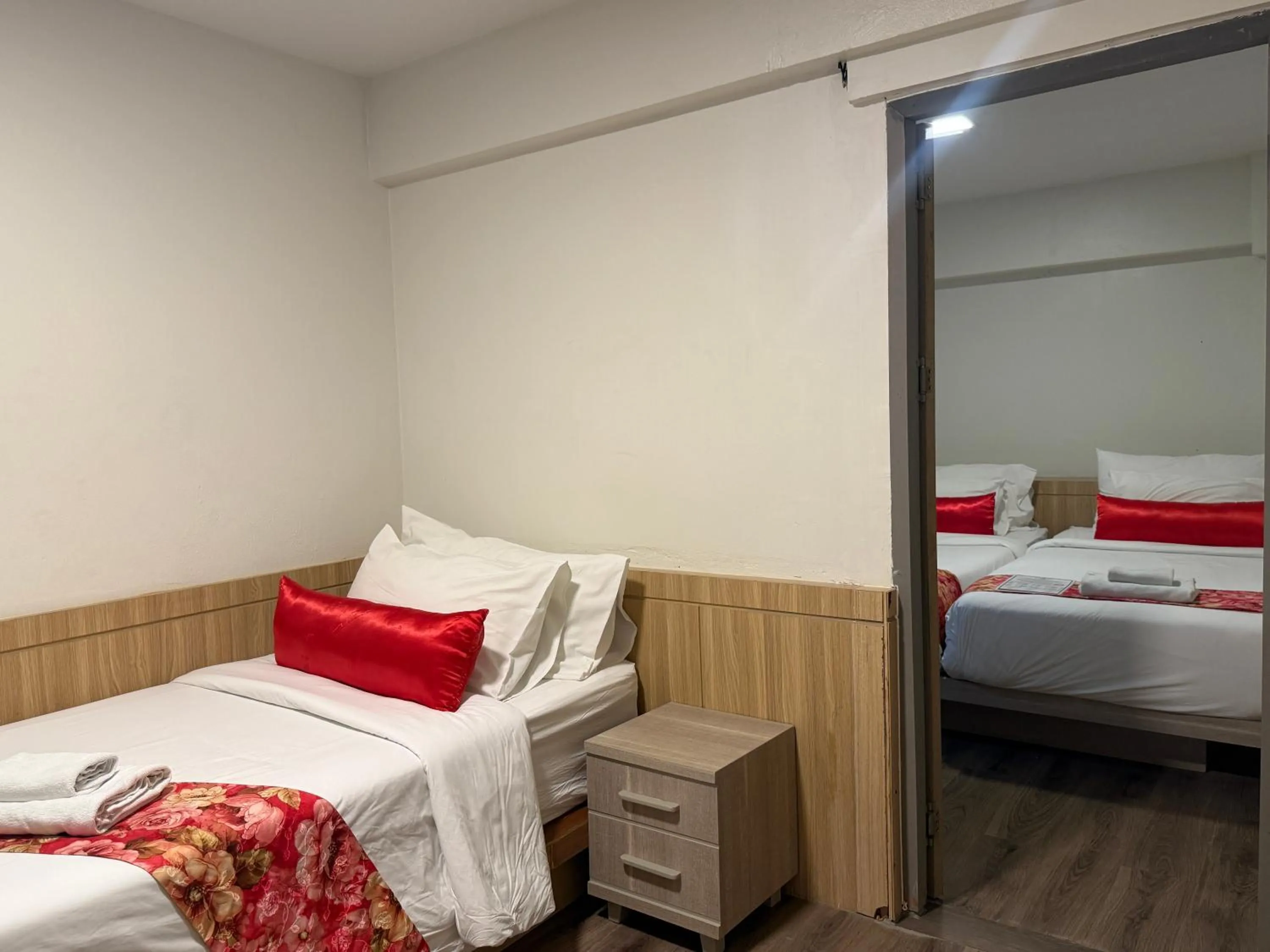 Bed in Wild Orchid Villa Bangkok