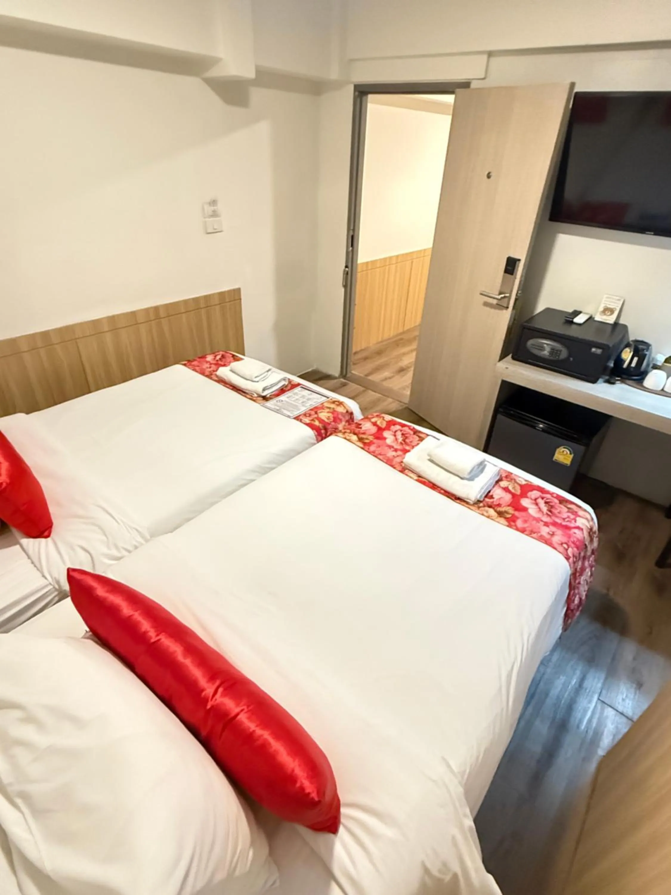 Bed in Wild Orchid Villa Bangkok