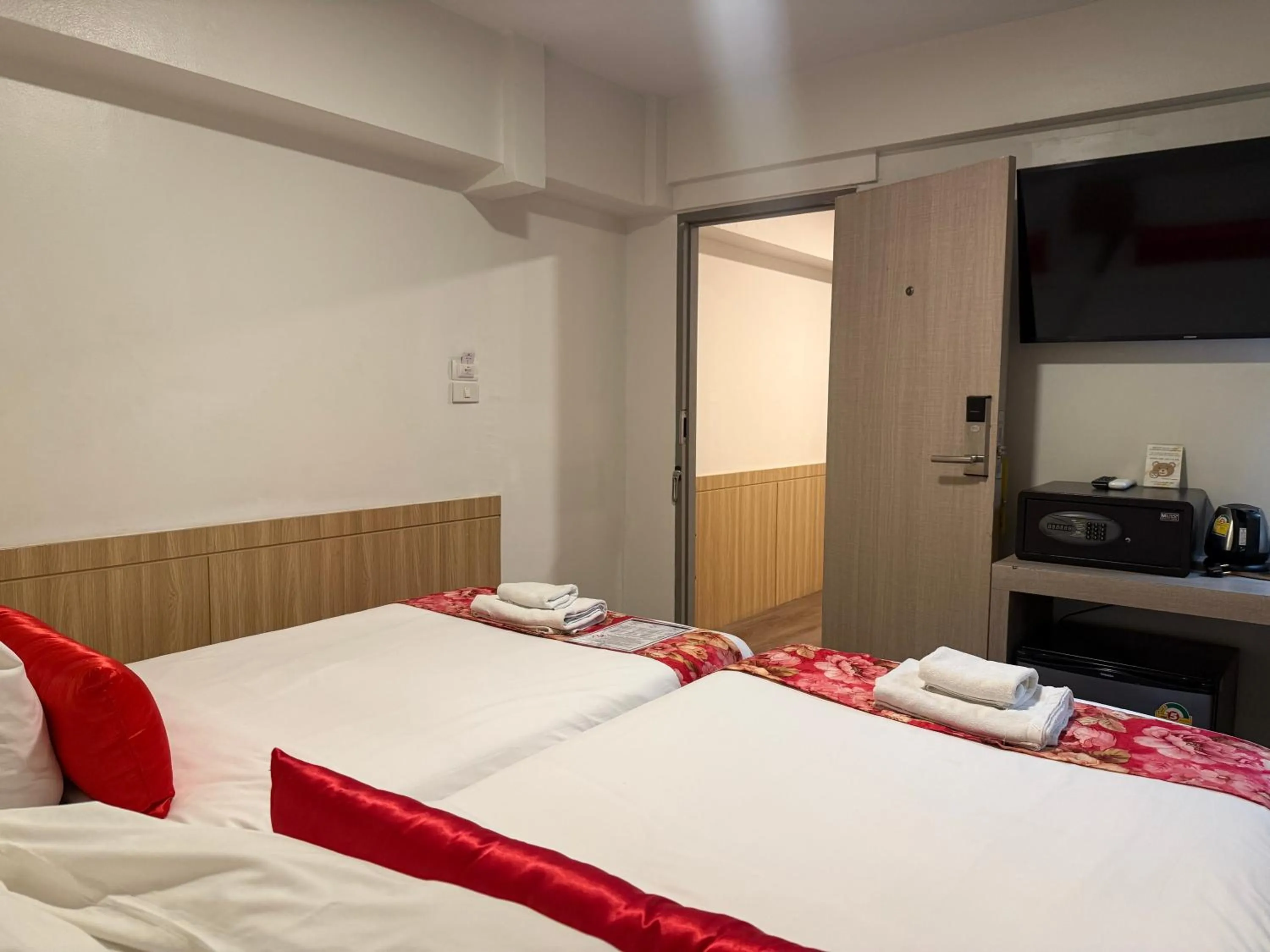 Bed in Wild Orchid Villa Bangkok