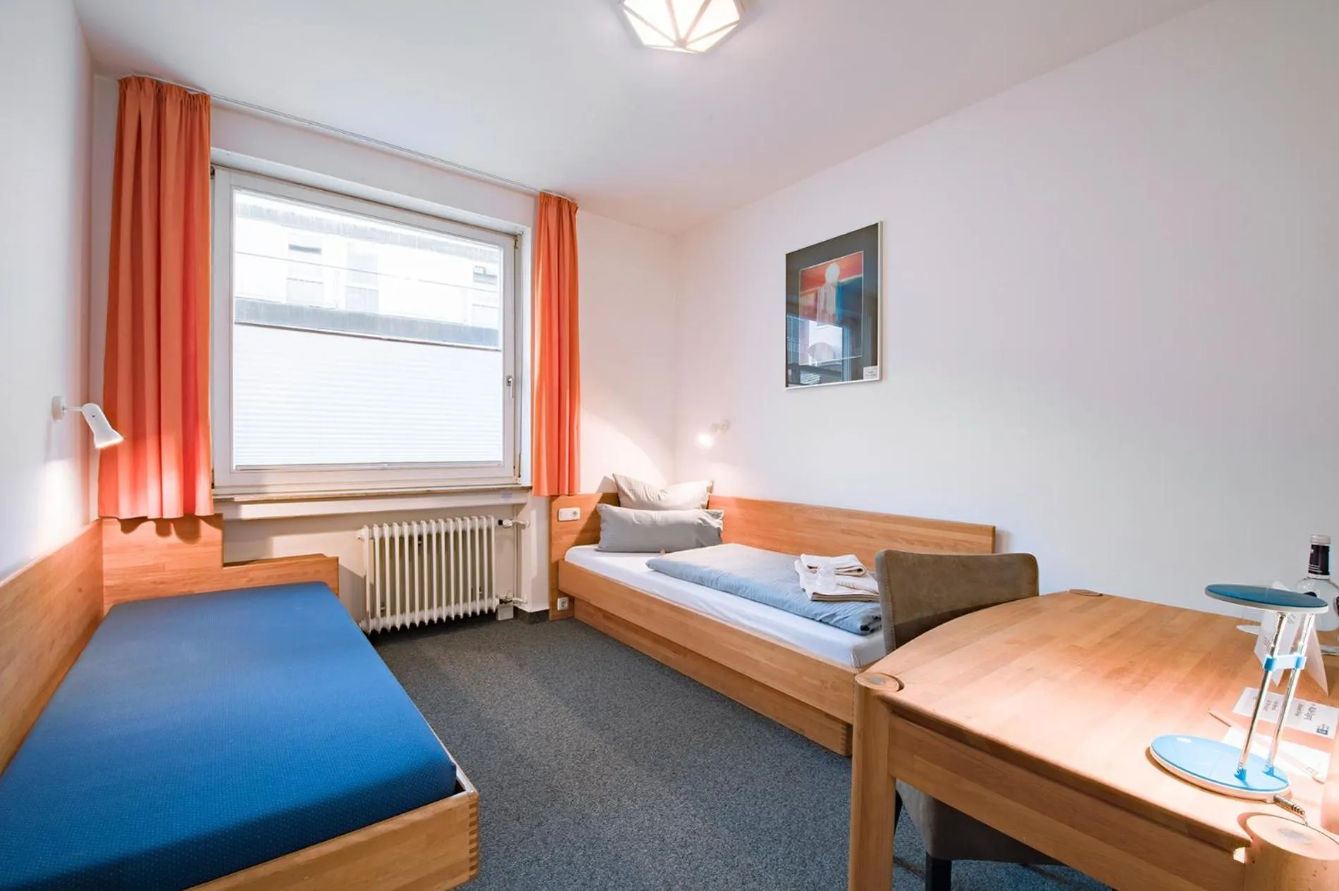 Photo of the whole room, Bed in Hotel der Akademie Caritas-Pirckheimer-Haus