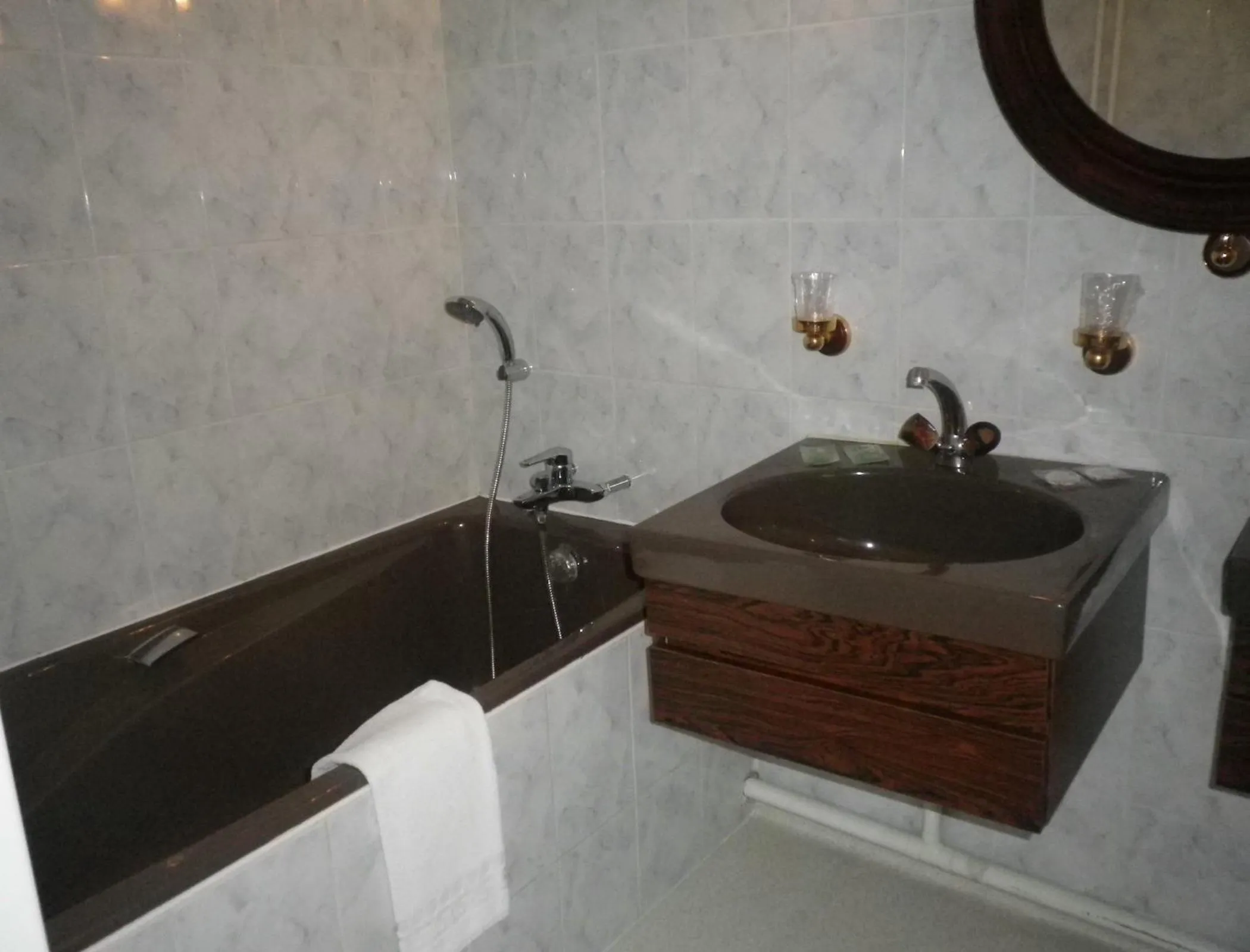 Bathroom in Logis-Cit'Hôtel des Vosges 5 rue de la gare