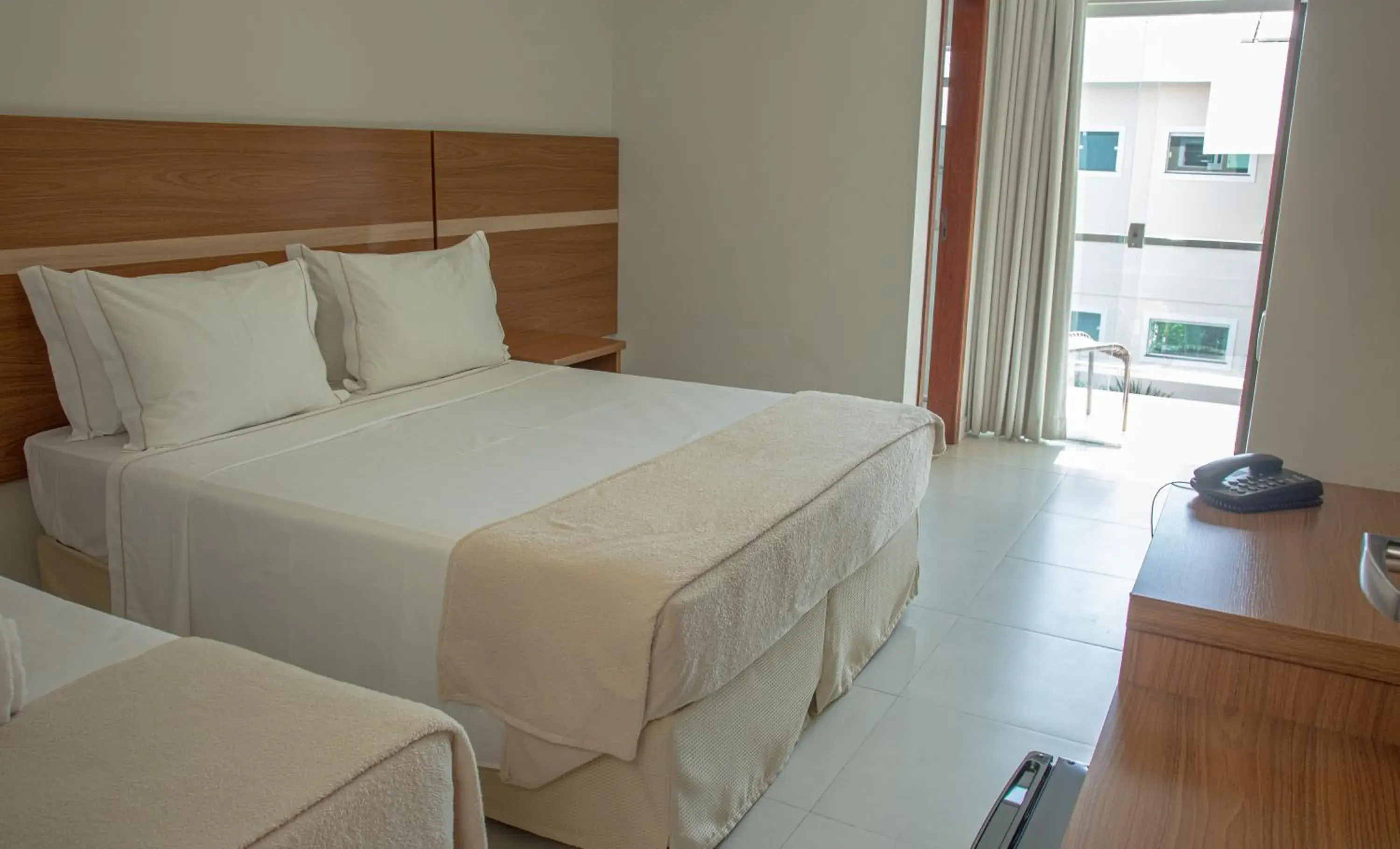 Bed in Orquídeas Praia Hotel Bed in Orquídeas Praia Hotel