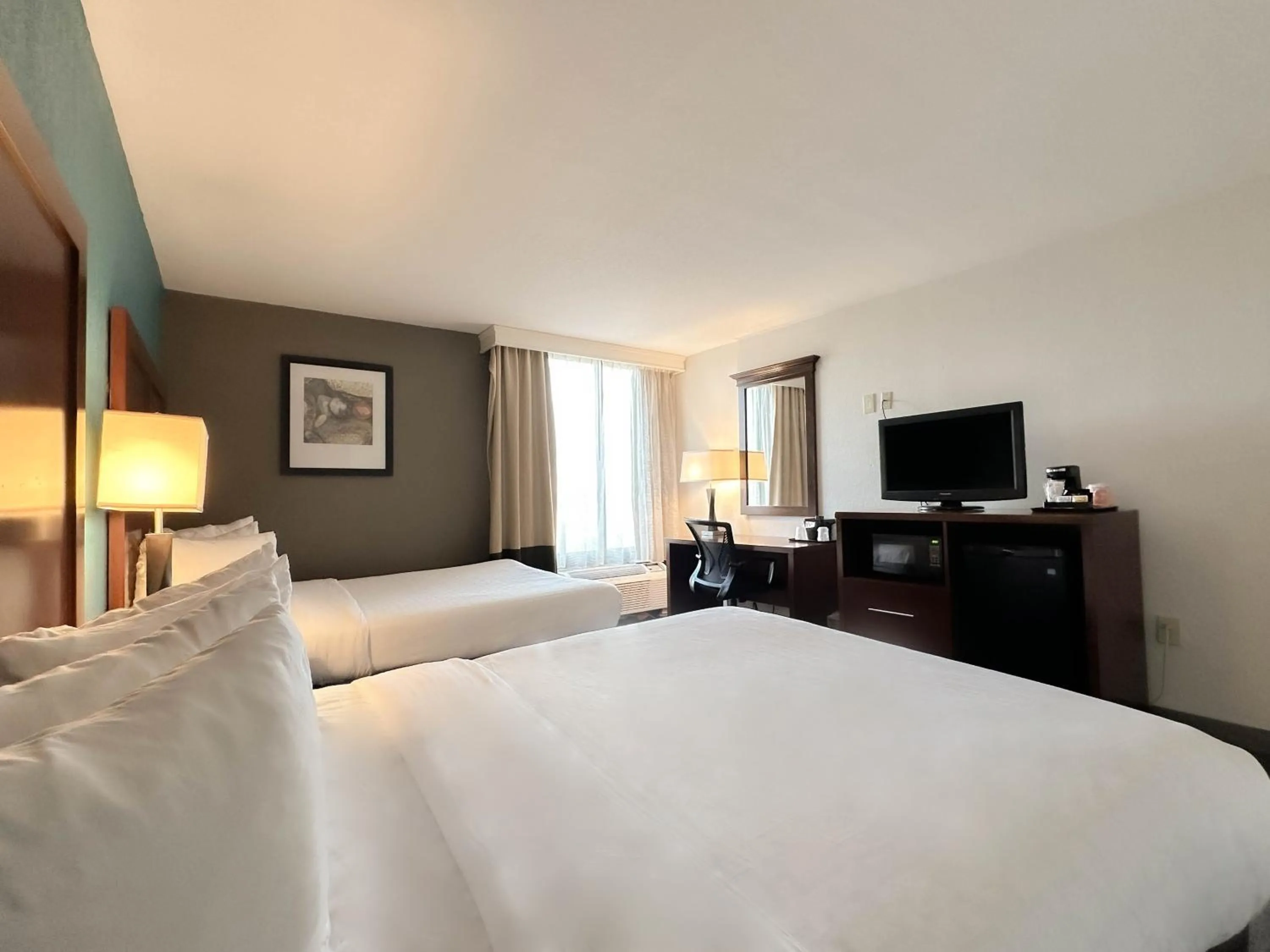 Bed in Comfort Inn & Suites Kissimmee by the Parks