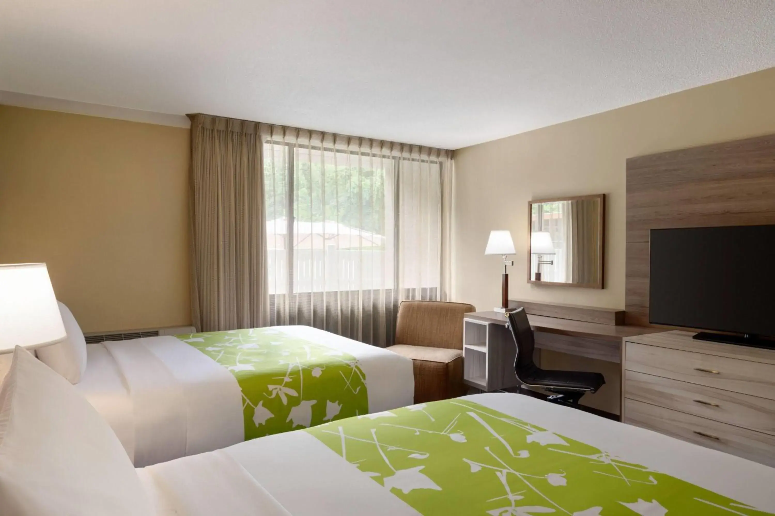 Photo of the whole room, Bed in Wyndham Garden Washington DC North Photo of the whole room, Bed in Wyndham Garden Washington DC North