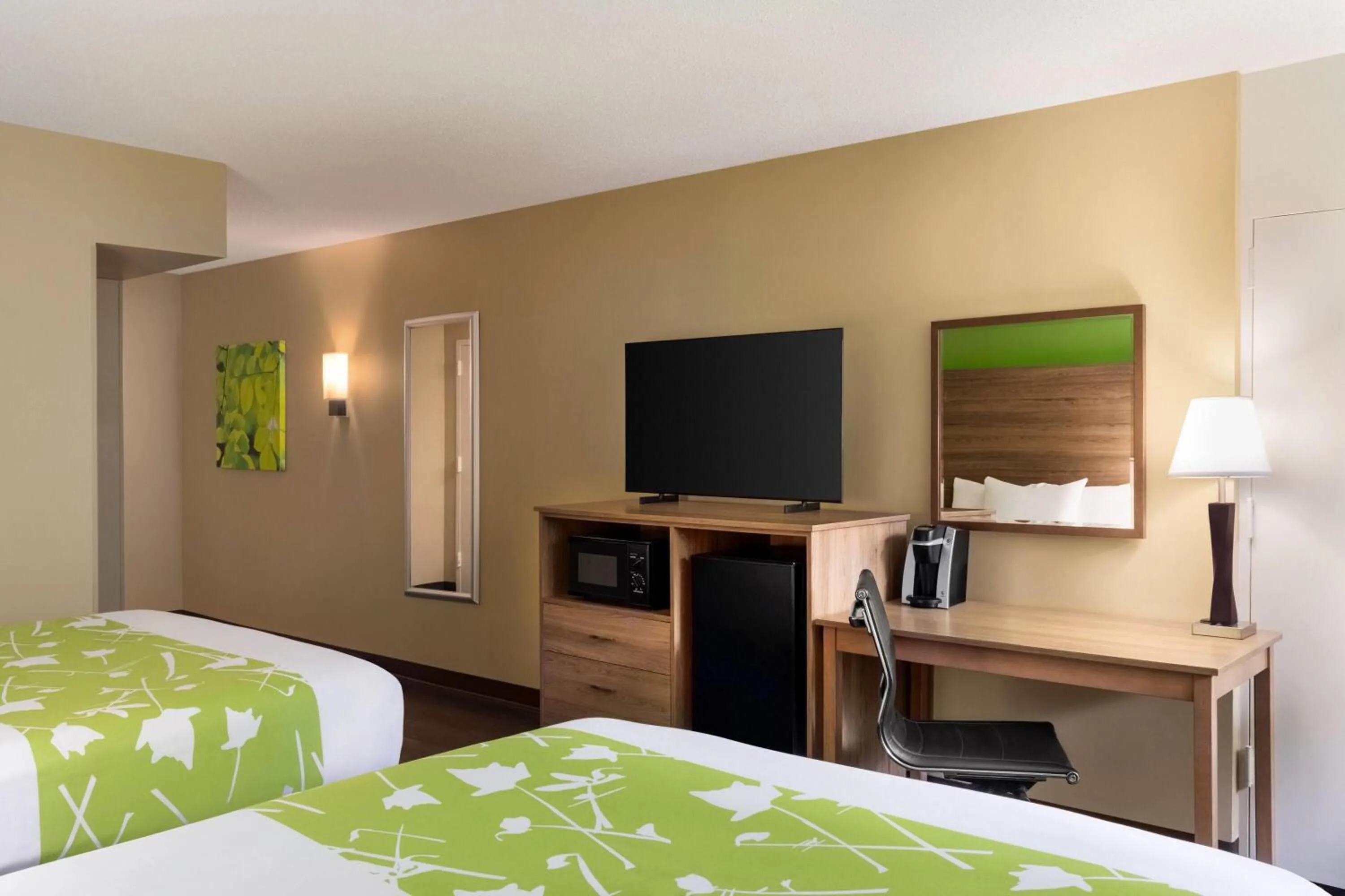 Photo of the whole room, Bed in Wyndham Garden Washington DC North