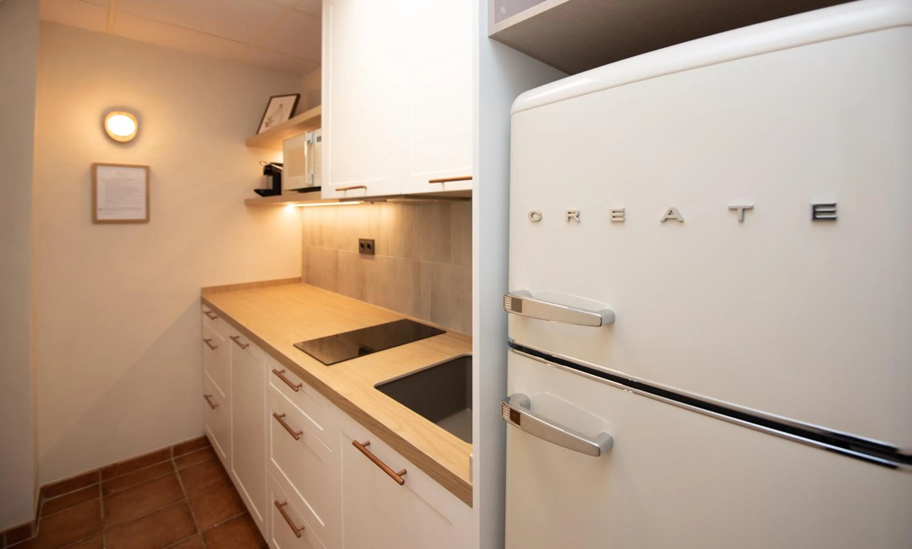 Communal kitchen in Hotel Caseta Nova