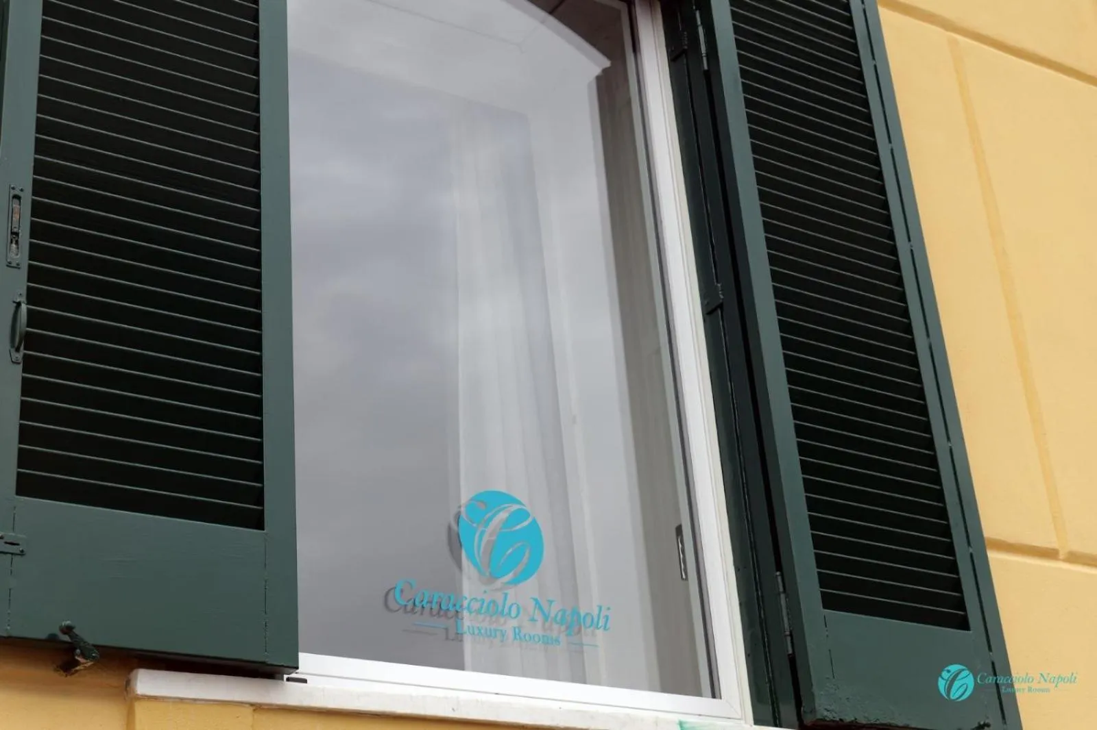 Property logo or sign in Caracciolo Napoli BeB