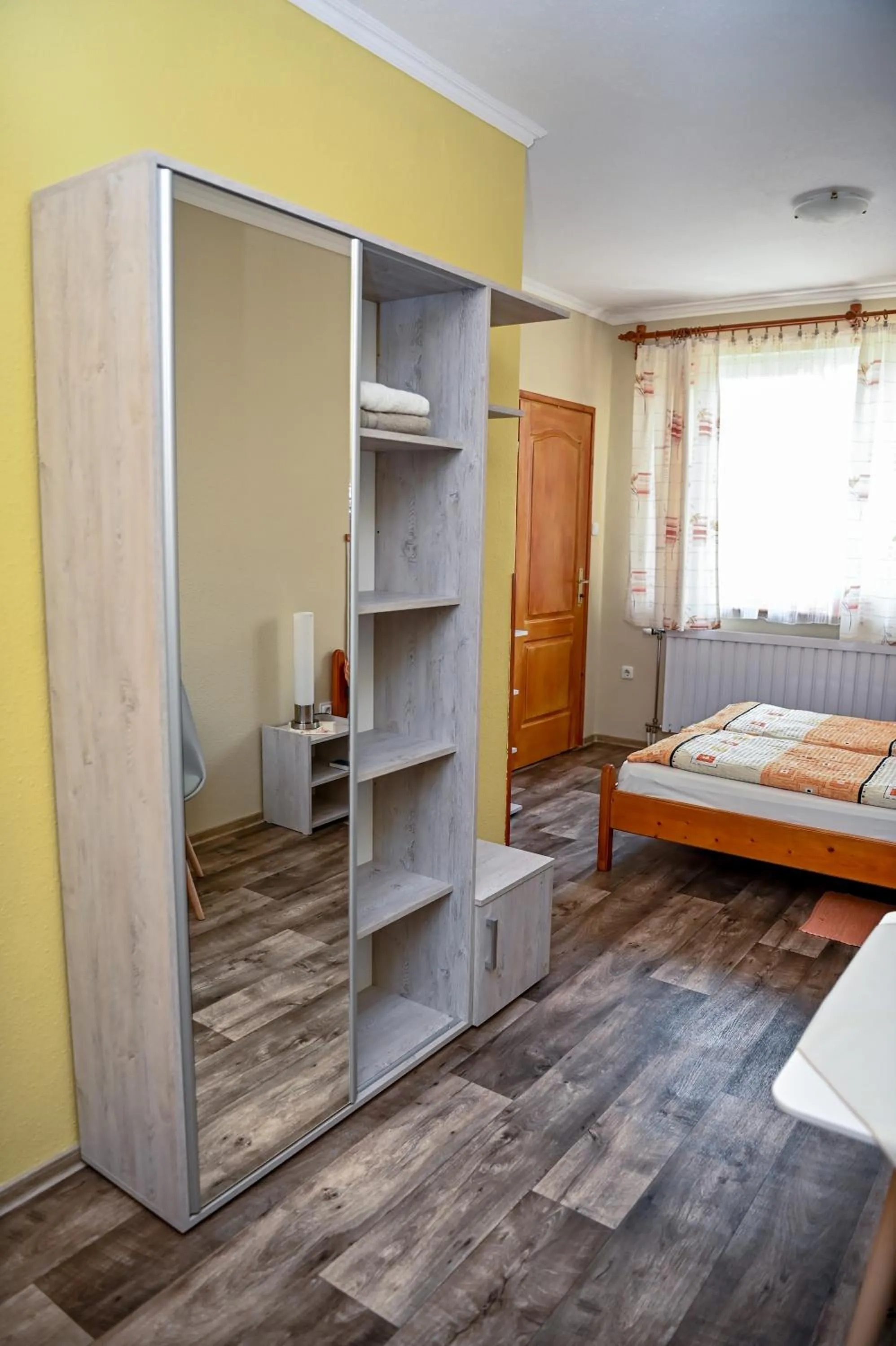Photo of the whole room, Bed in Angéla Vendegház