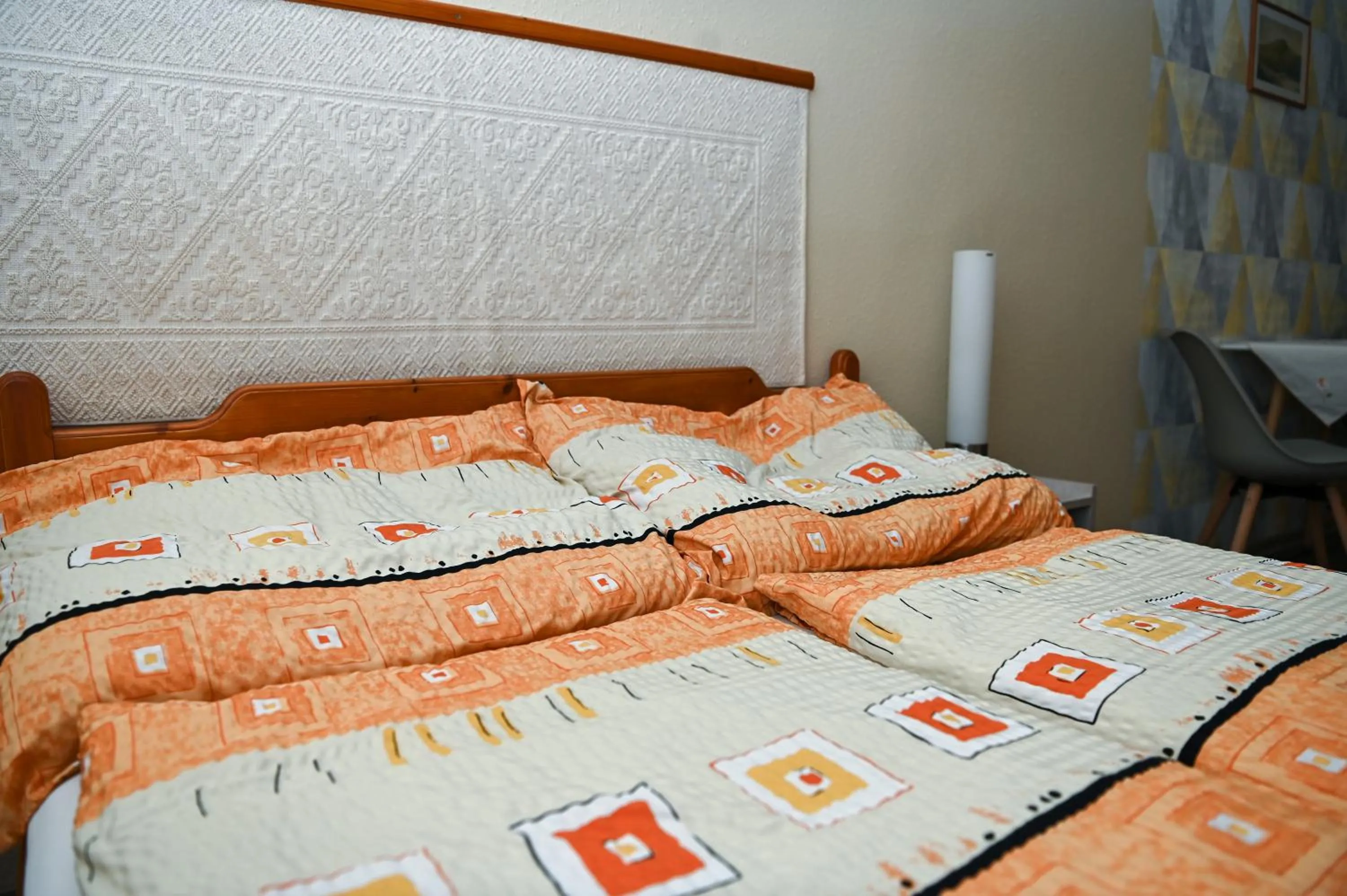 Bed in Angéla Vendegház