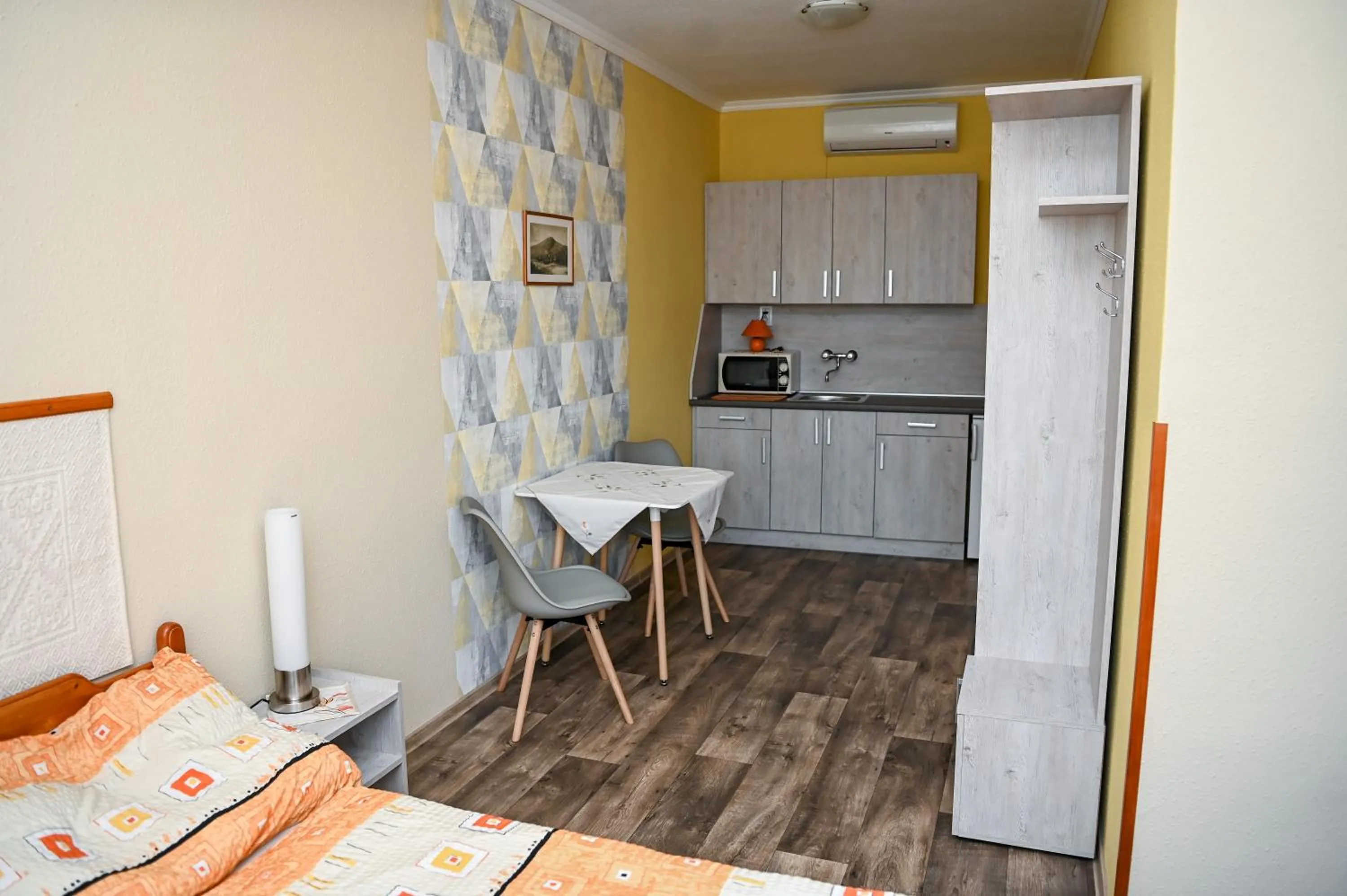 Kitchen or kitchenette in Angéla Vendegház